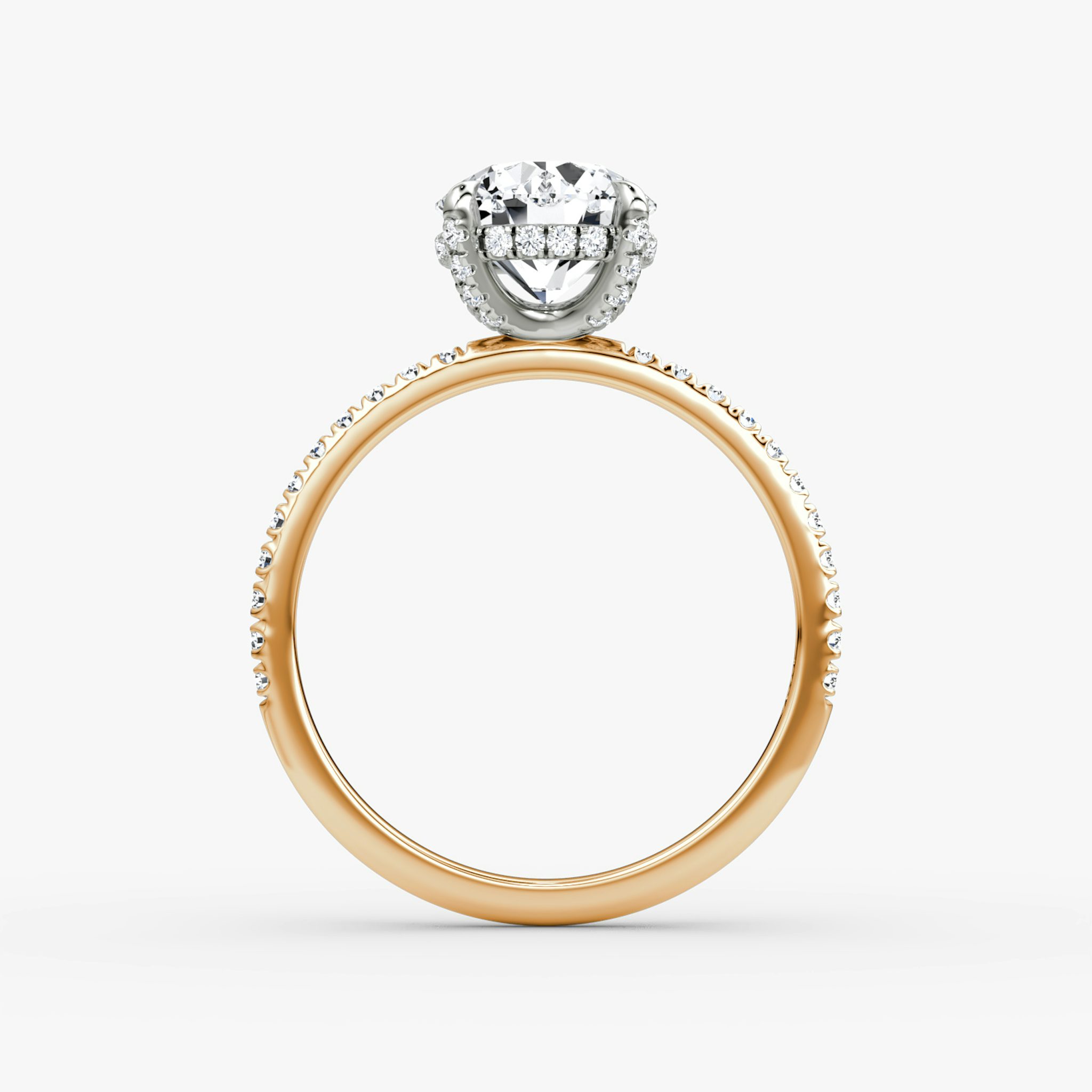 The Classic Hidden Halo | Round Brilliant | 14k | Rose Gold and Platinum | bandAccent: Pavé | bandWidth: standard | caratWeight: 1.0ct | prongStyle: Pavé | diamondOrientation: vertical