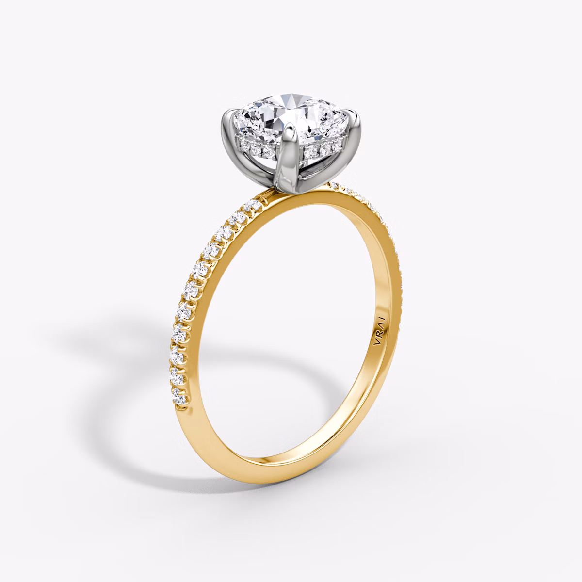 The Classic Hidden Halo | Cushion | 18k | Yellow Gold and Platinum | bandAccent: Pavé | bandWidth: standard | prongStyle: Plain | diamondOrientation: vertical | caratWeight: other