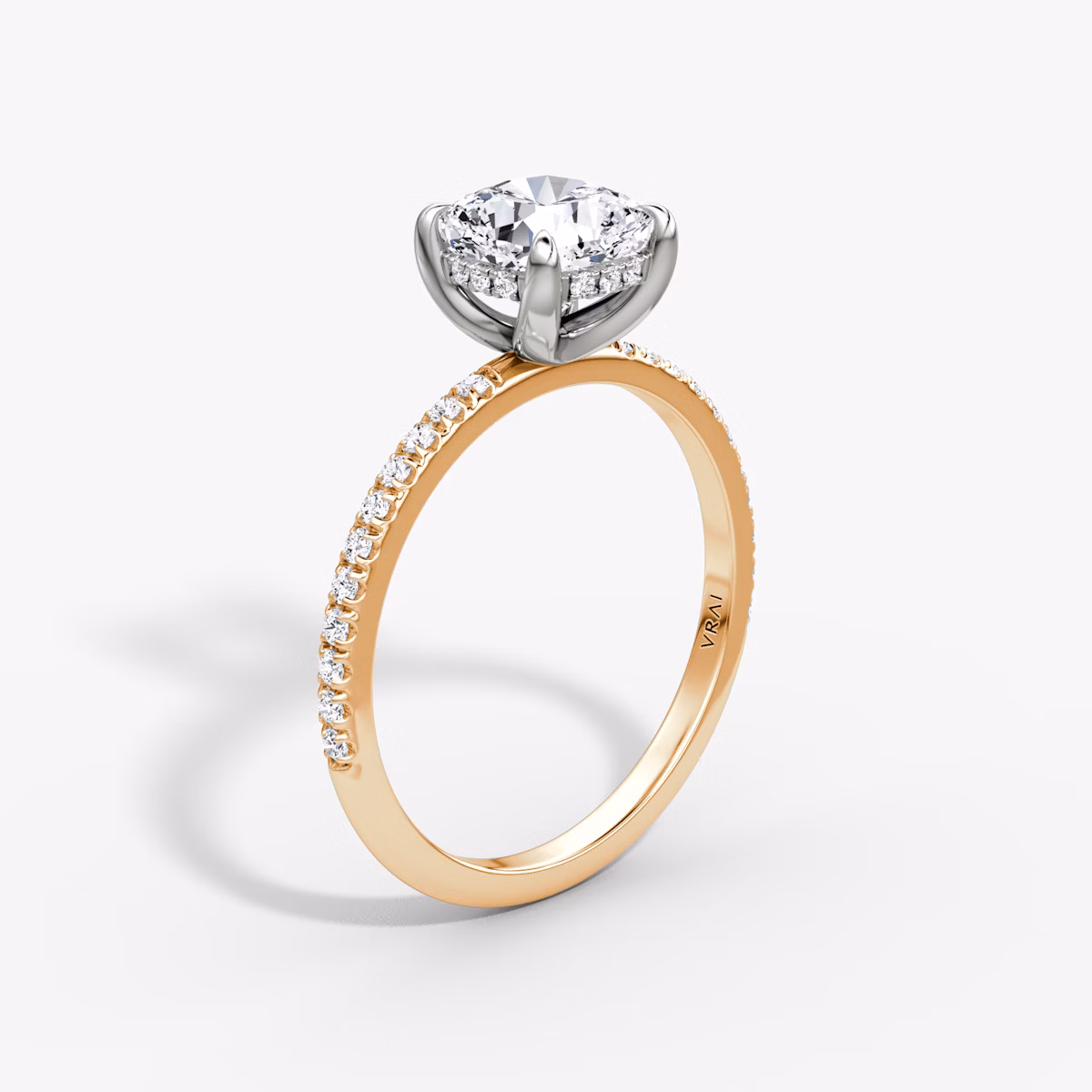 The Classic Hidden Halo | Cushion | 14k | Rose Gold and Platinum | bandAccent: Pavé | bandWidth: standard | prongStyle: Plain | diamondOrientation: vertical | caratWeight: other