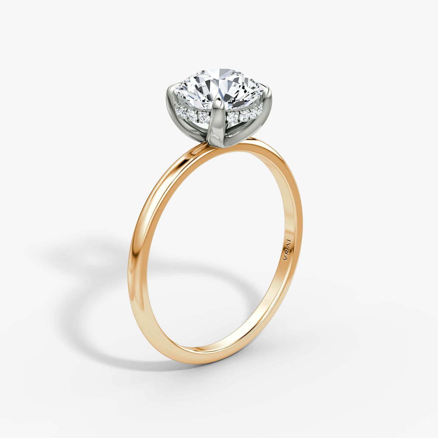 The Classic Hidden Halo | Round Brilliant | 14k | Rose Gold and Platinum | bandAccent: Plain | bandWidth: standard | caratWeight: 1.5ct | prongStyle: Plain | diamondOrientation: vertical