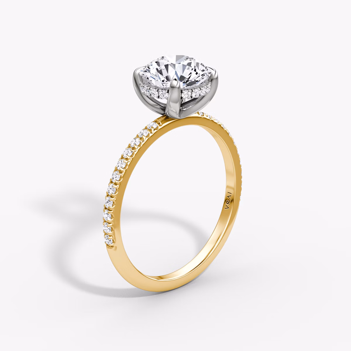 The Classic Hidden Halo | Round Brilliant | 18k | Yellow Gold and Platinum | bandAccent: Pavé | bandWidth: standard | caratWeight: 1.5ct | prongStyle: Plain | diamondOrientation: vertical