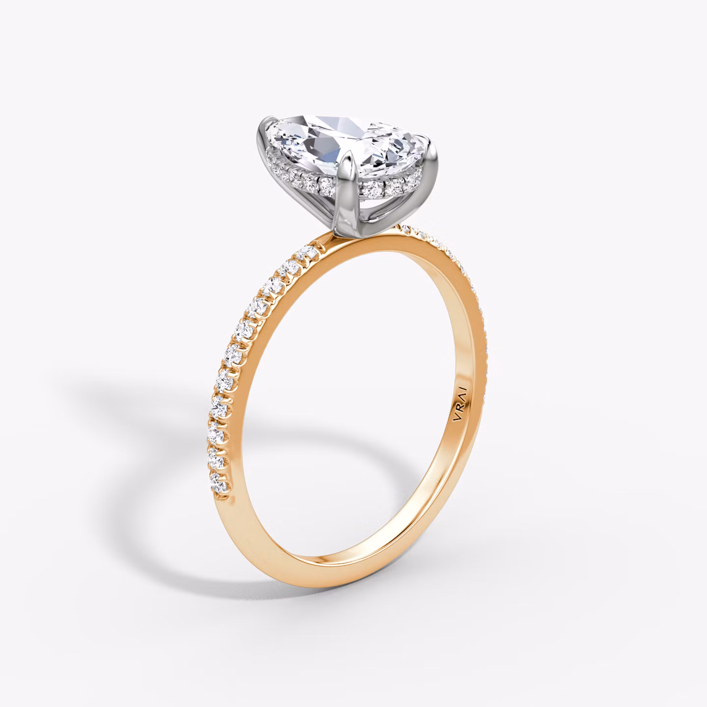 The Classic Hidden Halo | Pear | 14k | Rose Gold and Platinum | bandAccent: Pavé | bandWidth: standard | prongStyle: Plain | diamondOrientation: vertical | caratWeight: other