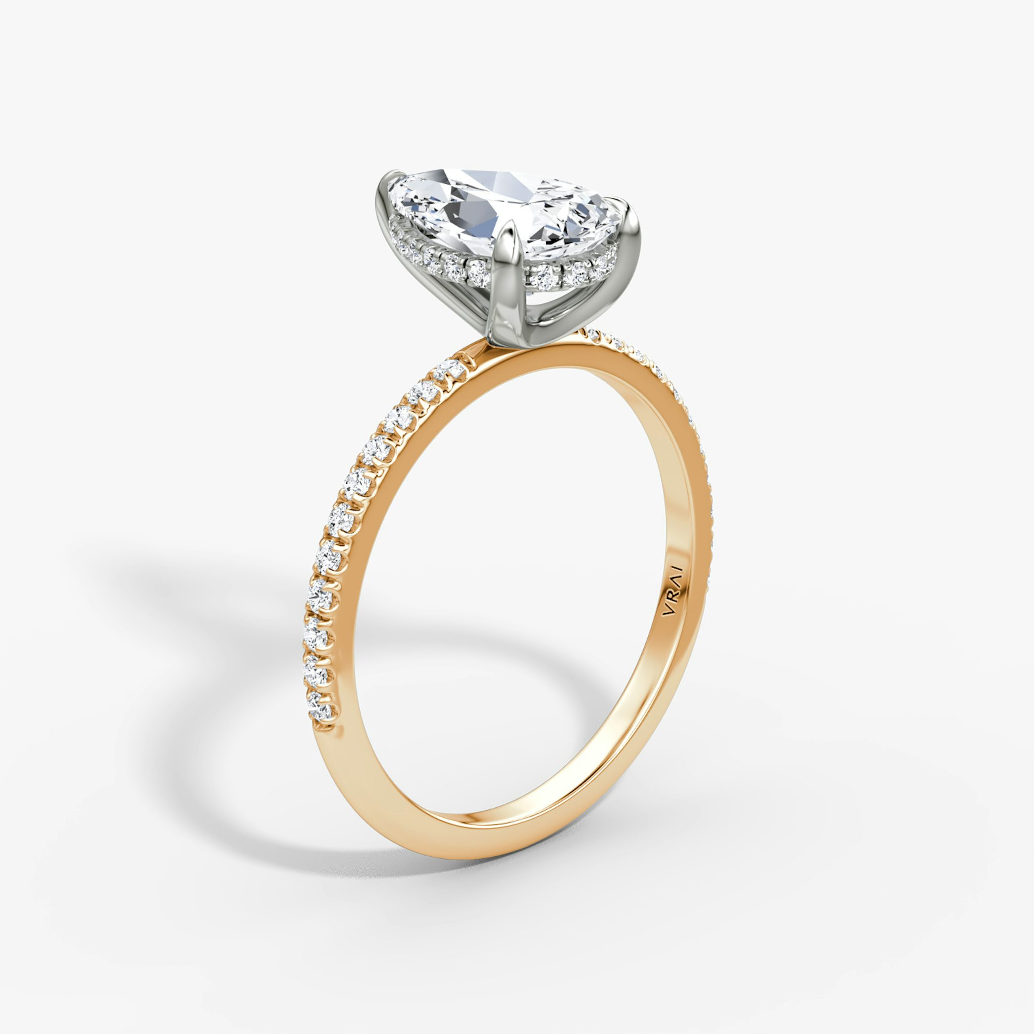 The Classic Hidden Halo | Pear | 14k | Rose Gold and Platinum | bandAccent: Pavé | bandWidth: standard | prongStyle: Plain | diamondOrientation: vertical | caratWeight: other