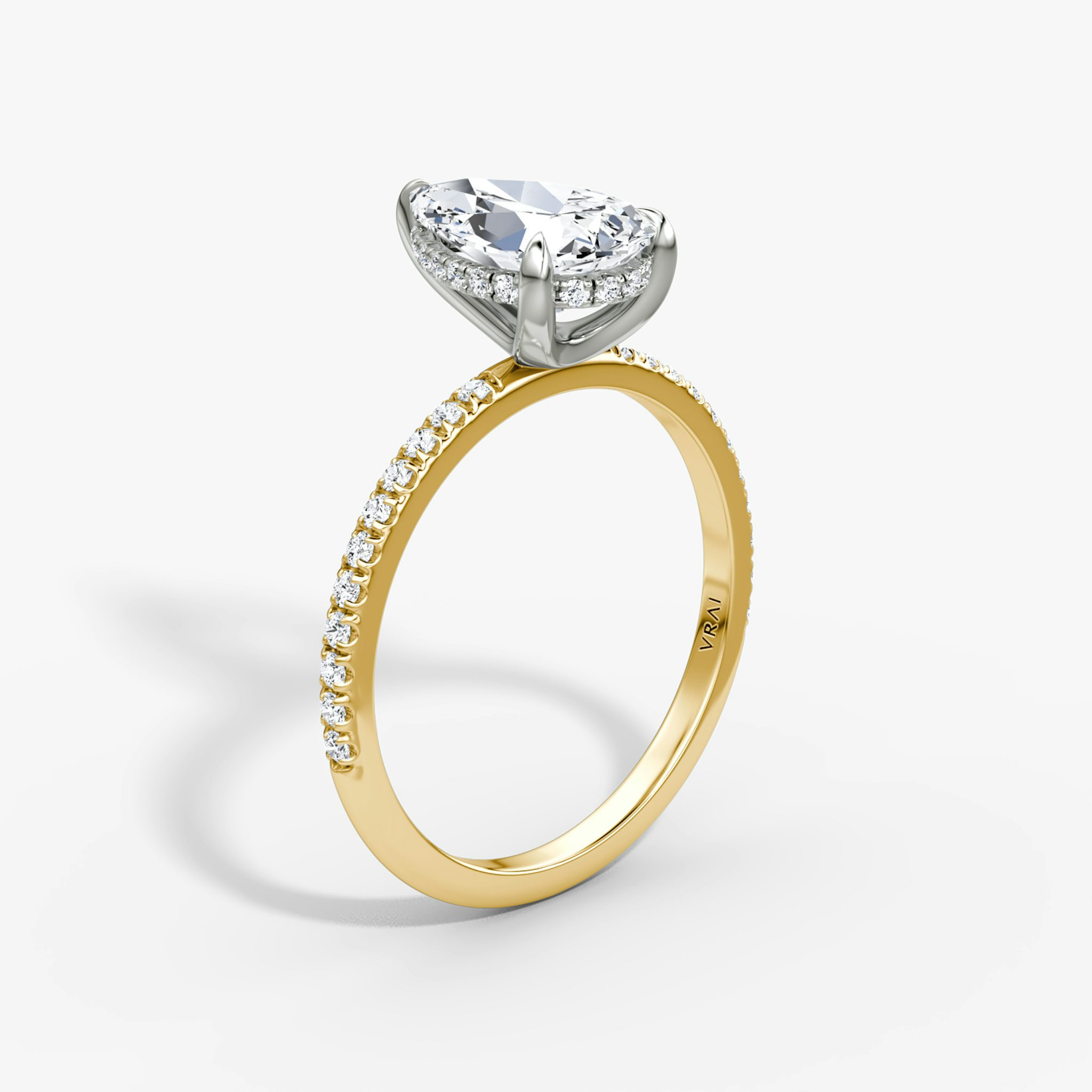 The Classic Hidden Halo | Pear | 18k | Yellow Gold and Platinum | bandAccent: Pavé | bandWidth: standard | prongStyle: Plain | diamondOrientation: vertical | caratWeight: other