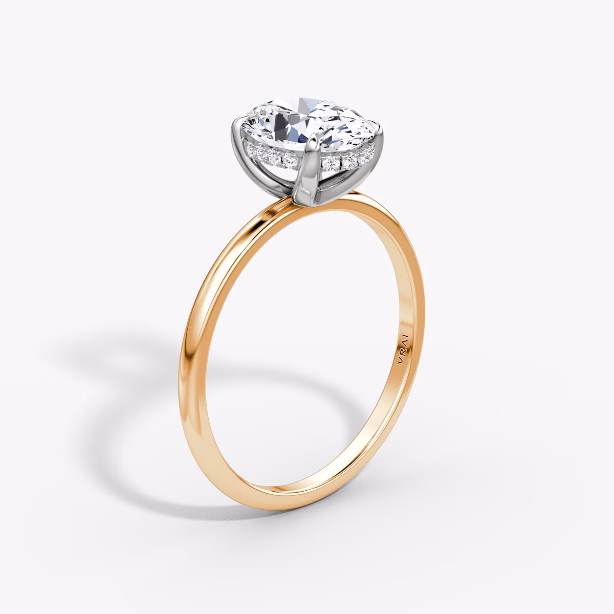 The Classic Hidden Halo | Oval | 14k | Rose Gold and Platinum | bandAccent: Plain | bandWidth: standard | prongStyle: Plain | diamondOrientation: vertical | caratWeight: other