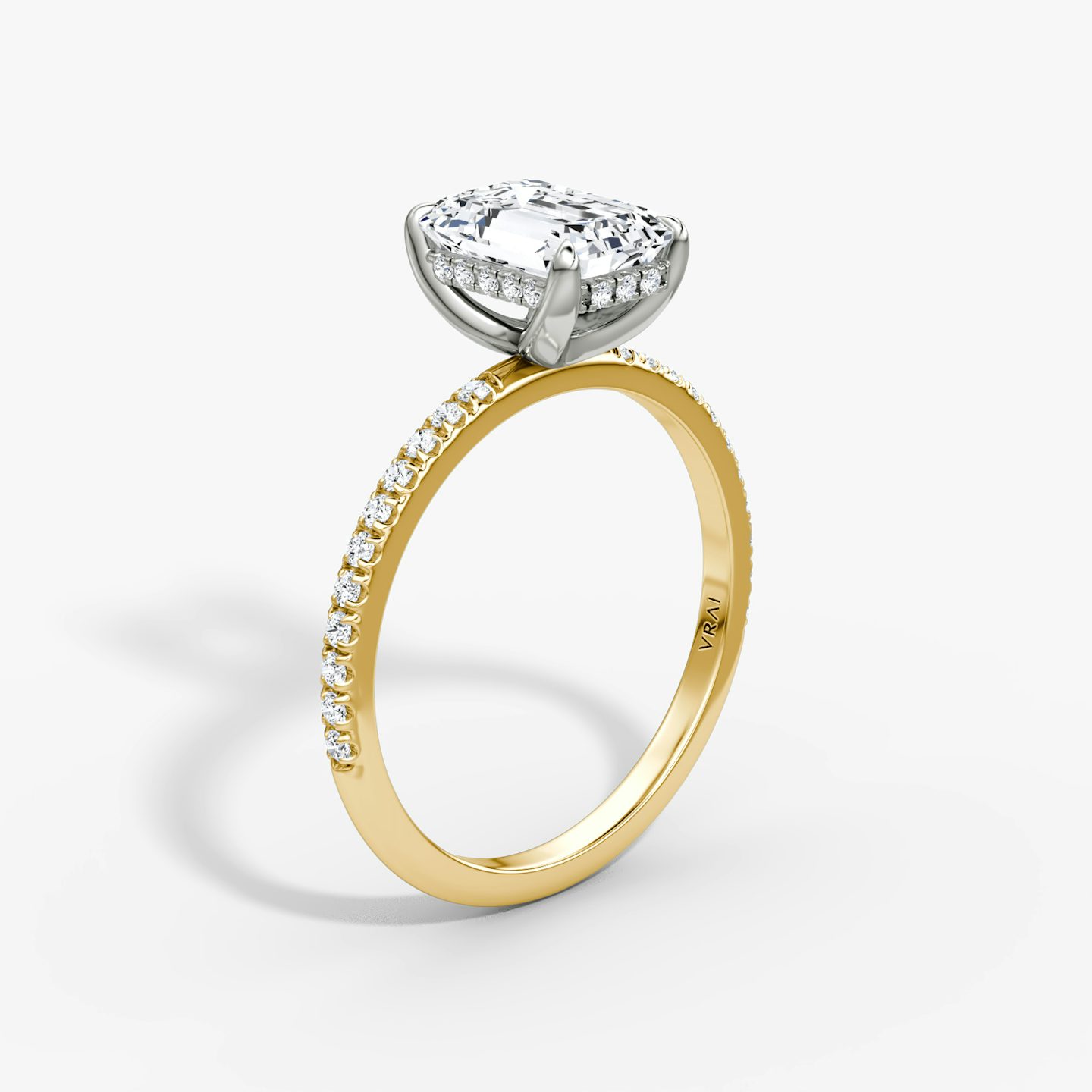 The Classic Hidden Halo | Emerald | 18k | Yellow Gold and Platinum | bandAccent: Pavé | bandWidth: standard | prongStyle: Plain | diamondOrientation: vertical | caratWeight: other