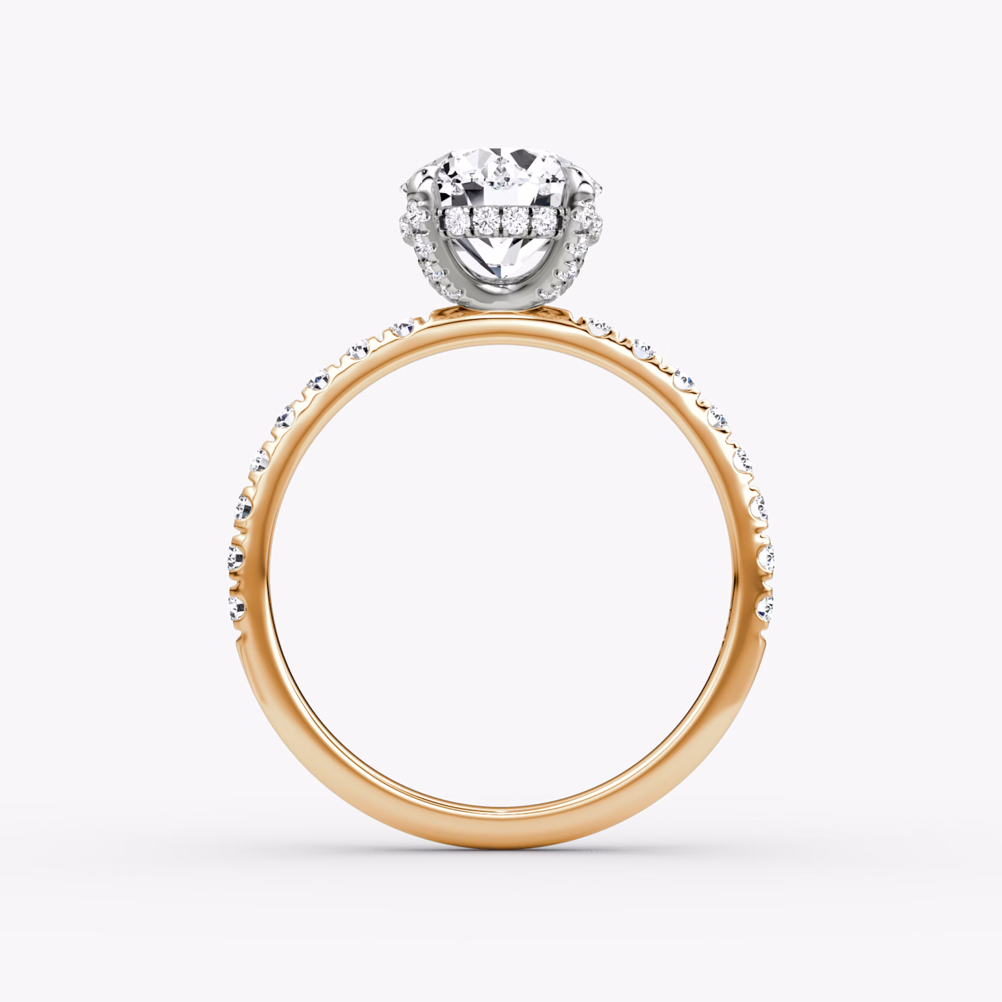 The Classic Hidden Halo | Round Brilliant | 14k | Rose Gold and Platinum | bandAccent: Pavé | bandWidth: large | caratWeight: other | prongStyle: Pavé | diamondOrientation: vertical