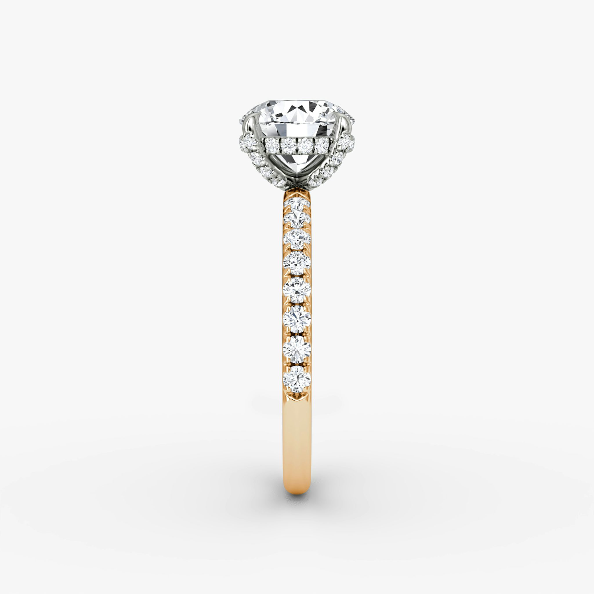 The Classic Hidden Halo | Round Brilliant | 14k | Rose Gold and Platinum | bandAccent: Pavé | bandWidth: large | caratWeight: other | prongStyle: Pavé | diamondOrientation: vertical