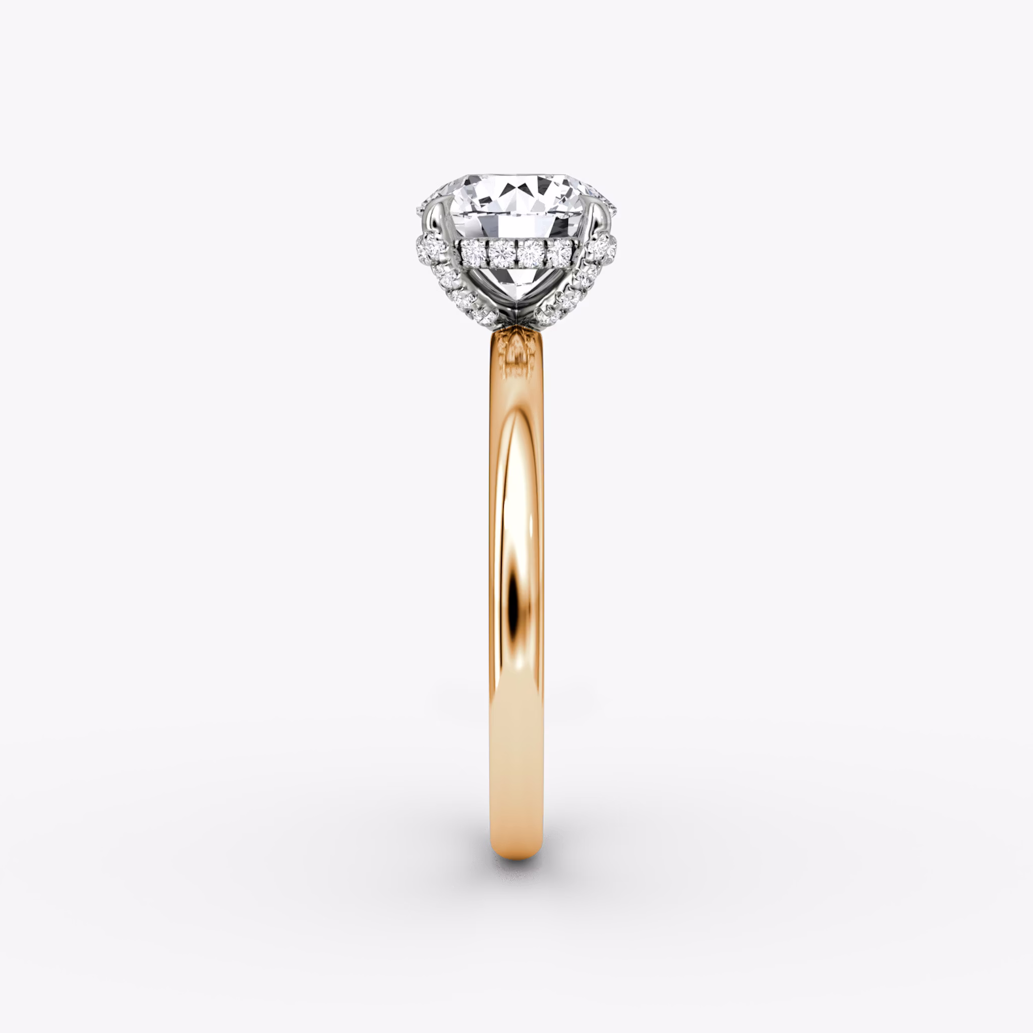 The Classic Hidden Halo | Round Brilliant | 14k | Rose Gold and Platinum | bandAccent: Plain | bandWidth: large | caratWeight: 1.0ct | prongStyle: Pavé | diamondOrientation: vertical