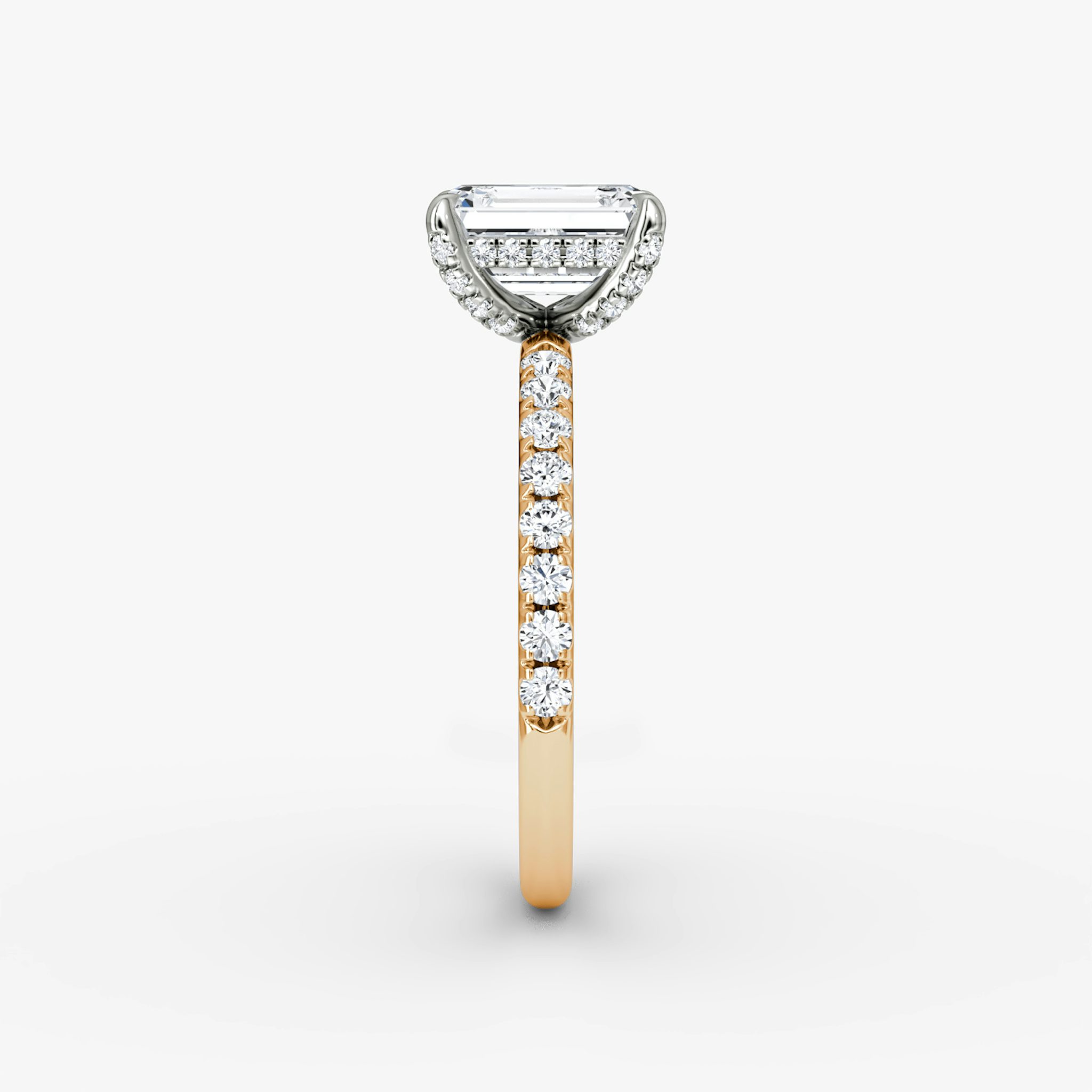 The Classic Hidden Halo | Emerald | 14k | Rose Gold and Platinum | bandAccent: Pavé | bandWidth: large | prongStyle: Pavé | diamondOrientation: vertical | caratWeight: other