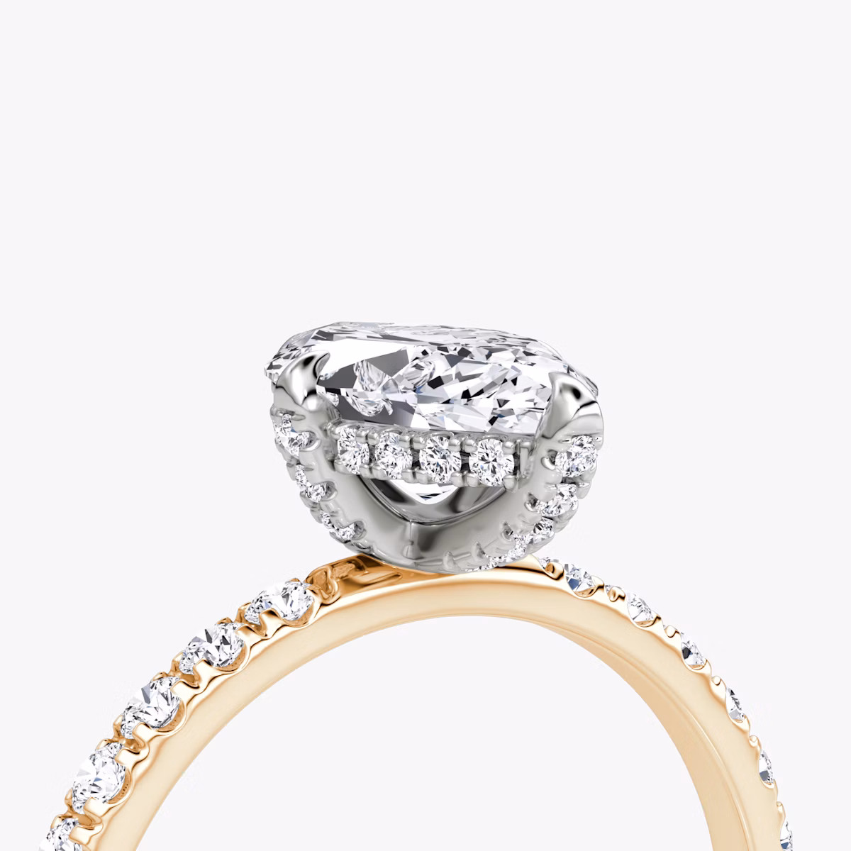 The Classic Hidden Halo | Marquise | 14k | Rose Gold and Platinum | bandAccent: Pavé | bandWidth: large | prongStyle: Pavé | diamondOrientation: vertical | caratWeight: other