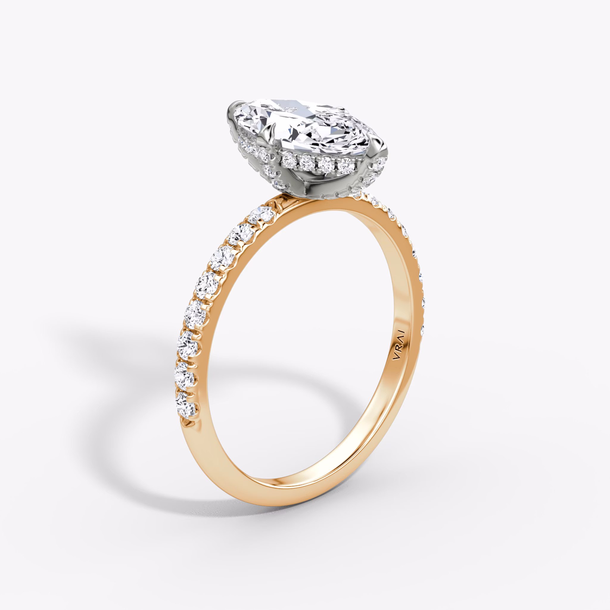 The Classic Hidden Halo | Marquise | 14k | Rose Gold and Platinum | bandAccent: Pavé | bandWidth: large | prongStyle: Pavé | diamondOrientation: vertical | caratWeight: other