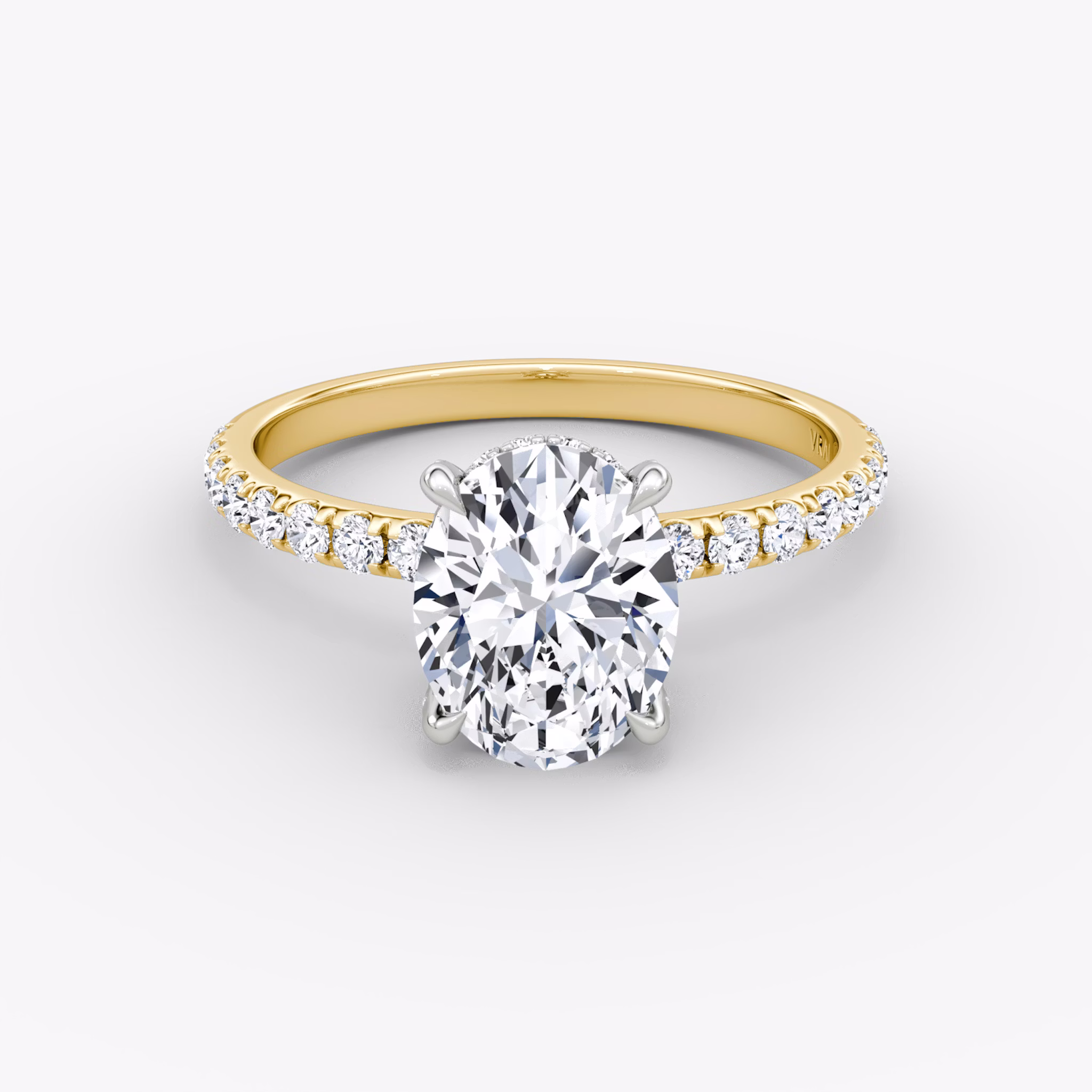 The Classic Hidden Halo | Oval | 18k | Yellow Gold and Platinum | bandAccent: Pavé | bandWidth: large | prongStyle: Pavé | diamondOrientation: vertical | caratWeight: other