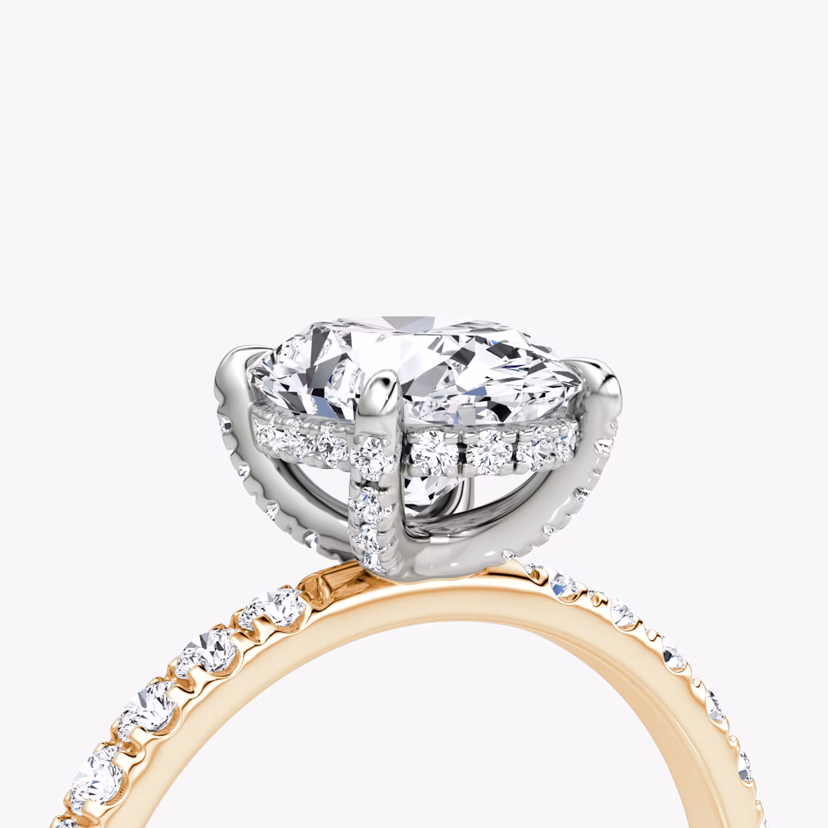 The Classic Hidden Halo | Oval | 14k | Rose Gold and Platinum | bandAccent: Pavé | bandWidth: large | prongStyle: Pavé | diamondOrientation: vertical | caratWeight: other