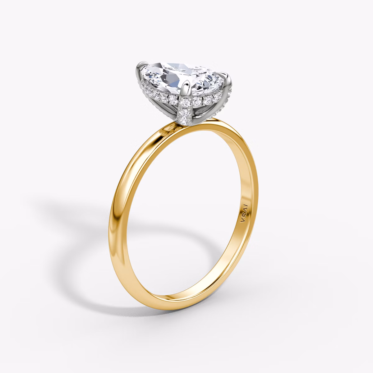 The Classic Hidden Halo | Pear | 18k | Yellow Gold and Platinum | bandAccent: Plain | bandWidth: large | prongStyle: Pavé | diamondOrientation: vertical | caratWeight: other