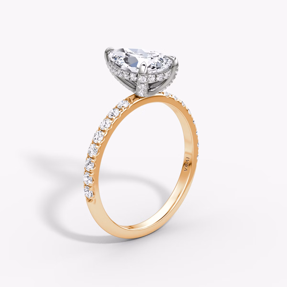 The Classic Hidden Halo | Pear | 14k | Rose Gold and Platinum | bandAccent: Pavé | bandWidth: large | prongStyle: Pavé | diamondOrientation: vertical | caratWeight: other