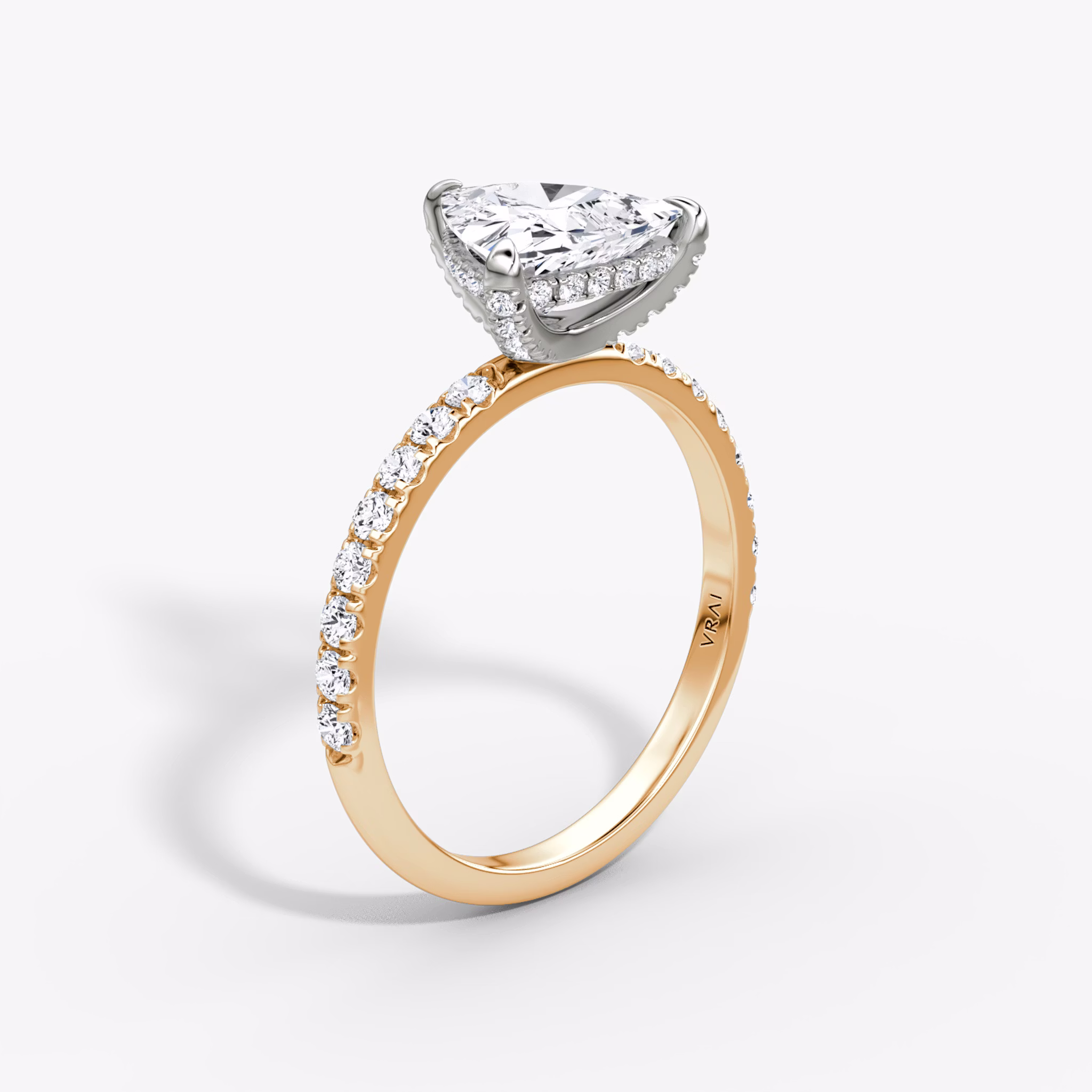 The Classic Hidden Halo | Trillion | 14k | Rose Gold and Platinum | bandAccent: Pavé | bandWidth: large | prongStyle: Pavé | diamondOrientation: vertical | caratWeight: other
