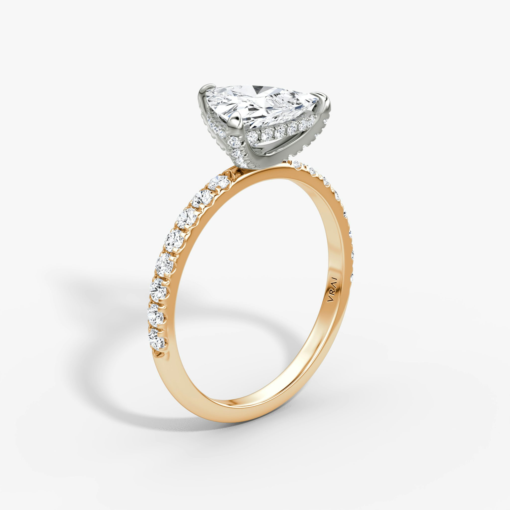 The Classic Hidden Halo | Trillion | 14k | Rose Gold and Platinum | bandAccent: Pavé | bandWidth: large | prongStyle: Pavé | diamondOrientation: vertical | caratWeight: other