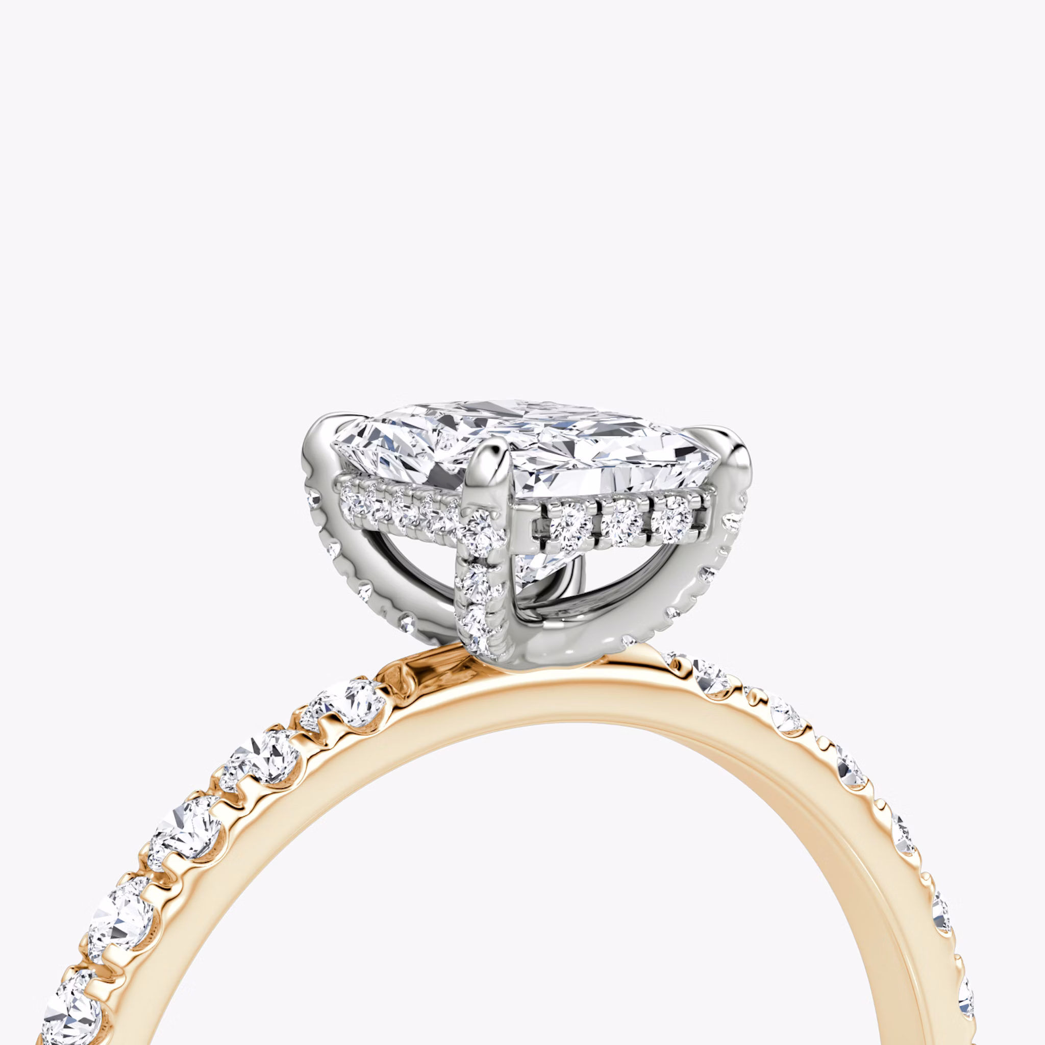 The Classic Hidden Halo | Radiant | 14k | Rose Gold and Platinum | bandAccent: Pavé | bandWidth: large | prongStyle: Pavé | diamondOrientation: vertical | caratWeight: other