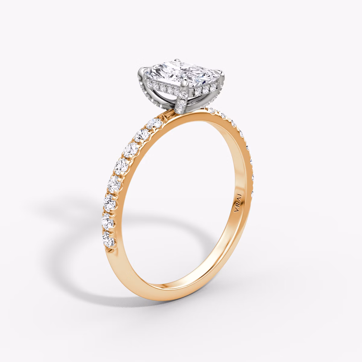 The Classic Hidden Halo | Radiant | 14k | Rose Gold and Platinum | bandAccent: Pavé | bandWidth: large | prongStyle: Pavé | diamondOrientation: vertical | caratWeight: other