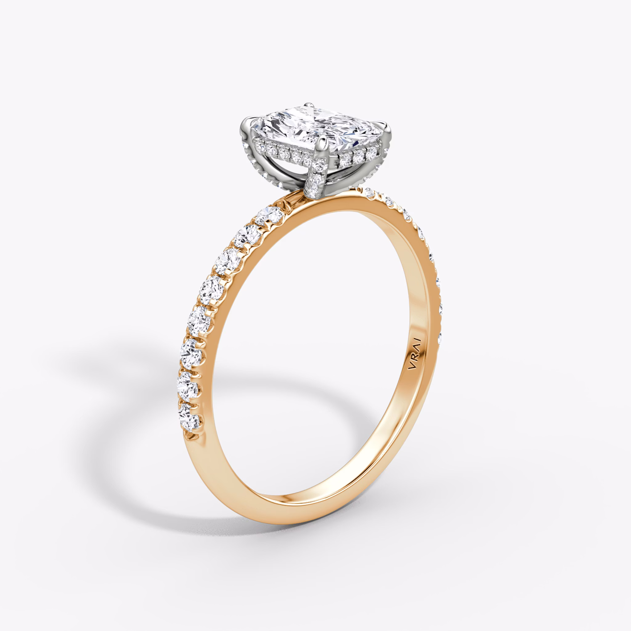 The Classic Hidden Halo | Radiant | 14k | Rose Gold and Platinum | bandAccent: Pavé | bandWidth: large | prongStyle: Pavé | diamondOrientation: vertical | caratWeight: other