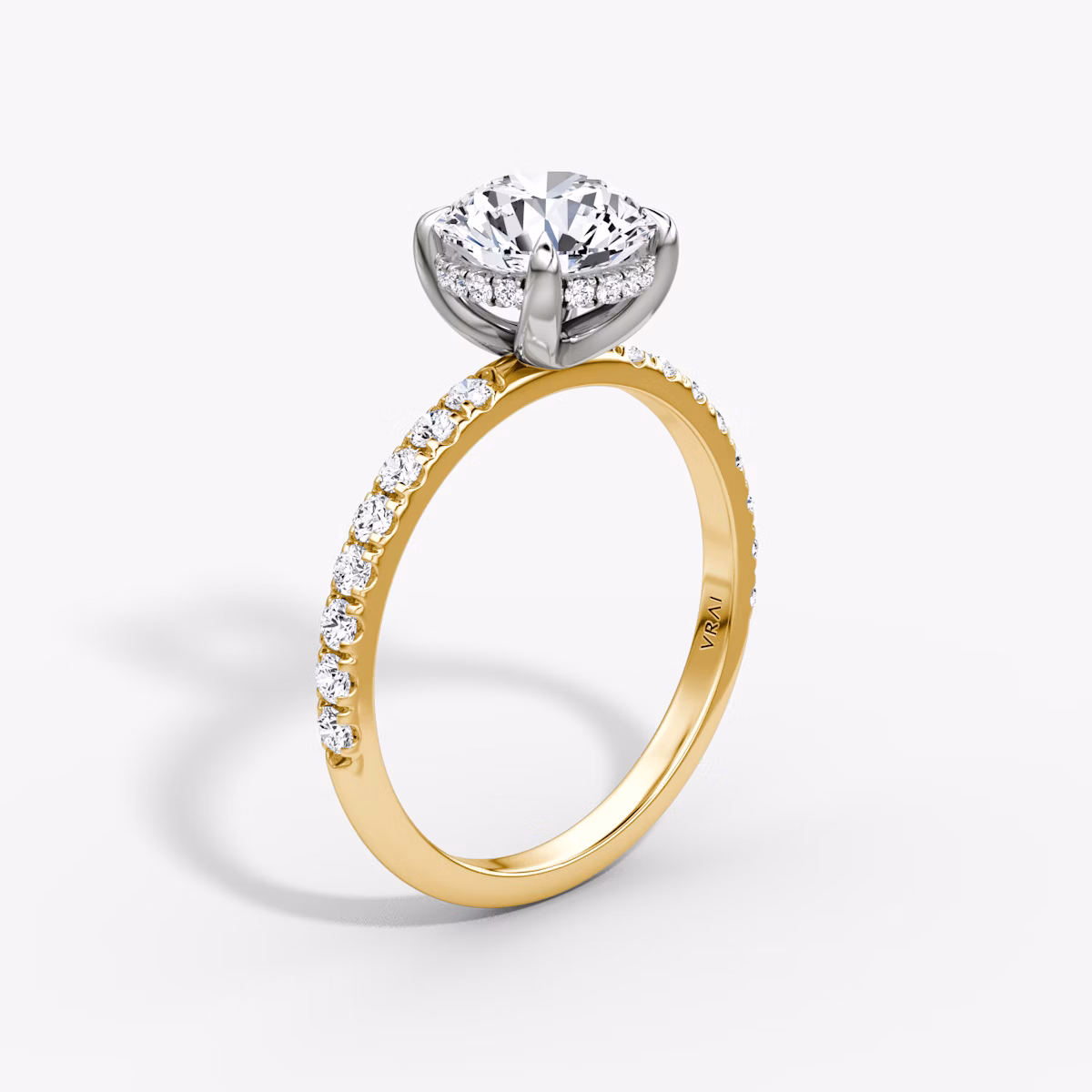 The Classic Hidden Halo | Round Brilliant | 18k | Yellow Gold and Platinum | bandAccent: Pavé | bandWidth: large | caratWeight: 1.5ct | prongStyle: Plain | diamondOrientation: vertical