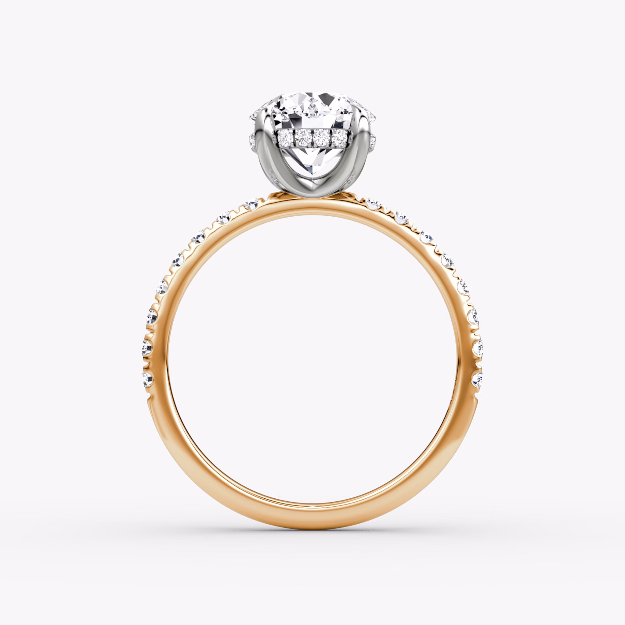 The Classic Hidden Halo | Round Brilliant | 14k | Rose Gold and Platinum | bandAccent: Pavé | bandWidth: large | caratWeight: other | prongStyle: Plain | diamondOrientation: vertical
