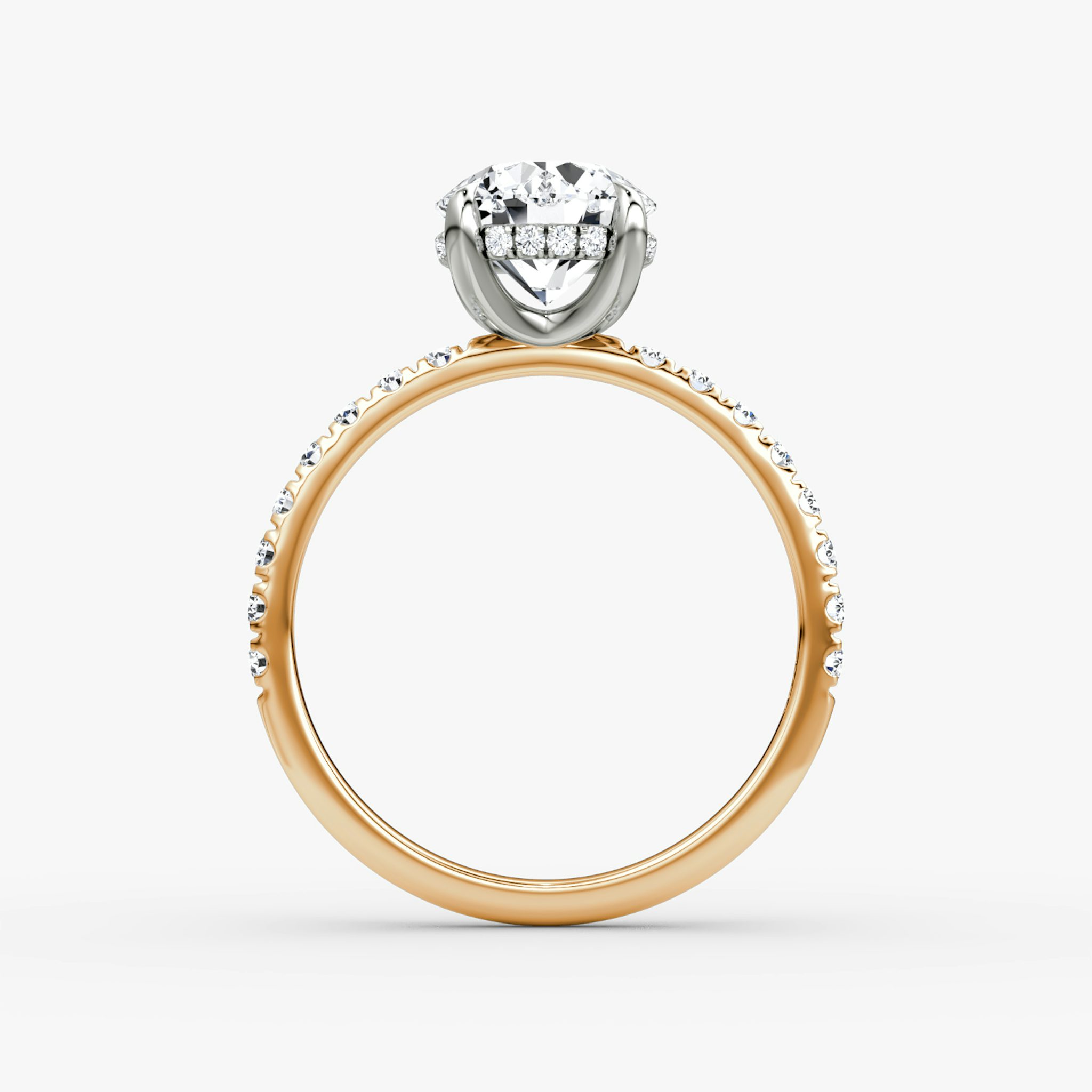 The Classic Hidden Halo | Round Brilliant | 14k | Rose Gold and Platinum | bandAccent: Pavé | bandWidth: large | caratWeight: other | prongStyle: Plain | diamondOrientation: vertical