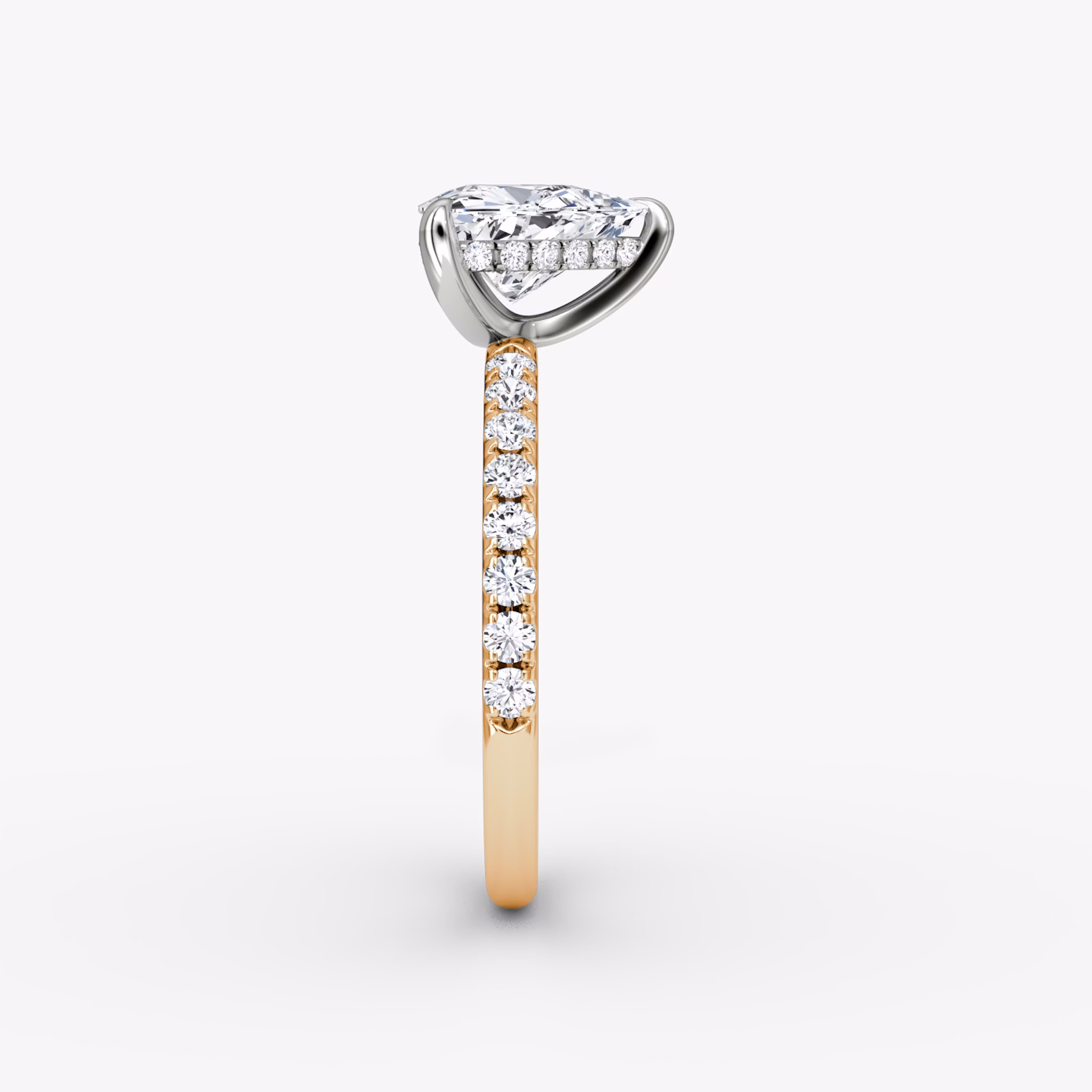 The Classic Hidden Halo | Trillion | 14k | Rose Gold and Platinum | bandAccent: Pavé | bandWidth: large | prongStyle: Plain | diamondOrientation: vertical | caratWeight: other