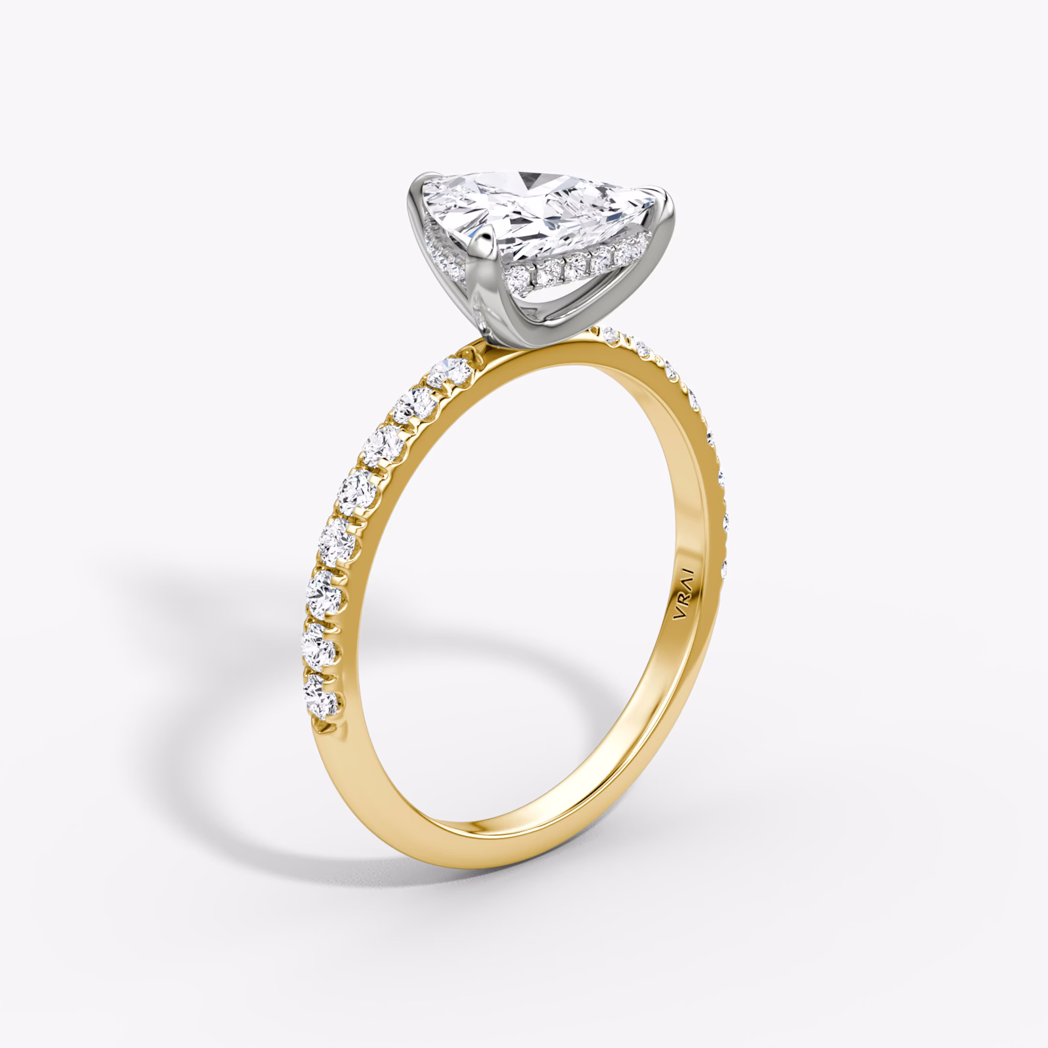 The Classic Hidden Halo | Trillion | 18k | Yellow Gold and Platinum | bandAccent: Pavé | bandWidth: large | prongStyle: Plain | diamondOrientation: vertical | caratWeight: other