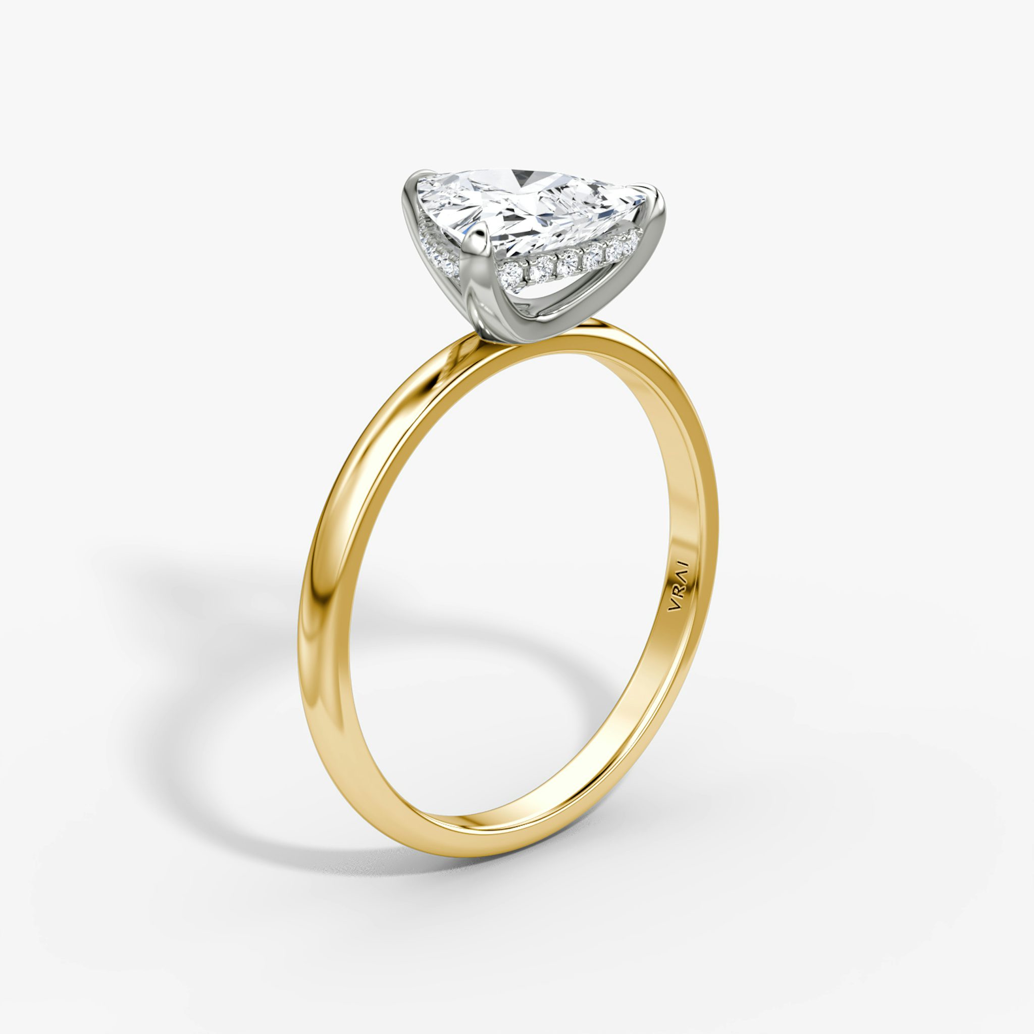 The Classic Hidden Halo | Trillion | 18k | Yellow Gold and Platinum | bandAccent: Plain | bandWidth: large | prongStyle: Plain | diamondOrientation: vertical | caratWeight: other