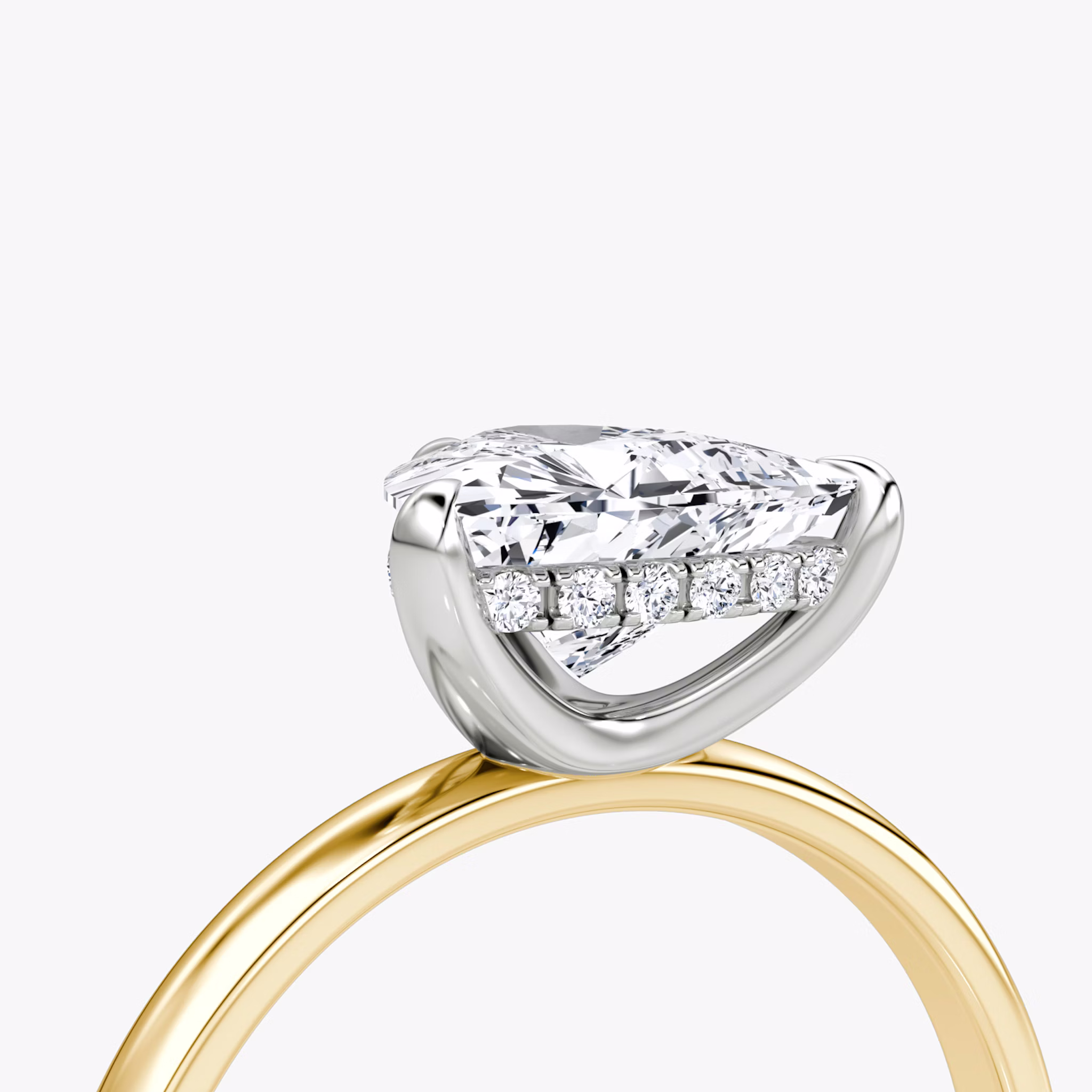 The Classic Hidden Halo | Trillion | 18k | Yellow Gold and Platinum | bandAccent: Plain | bandWidth: large | prongStyle: Plain | diamondOrientation: vertical | caratWeight: other