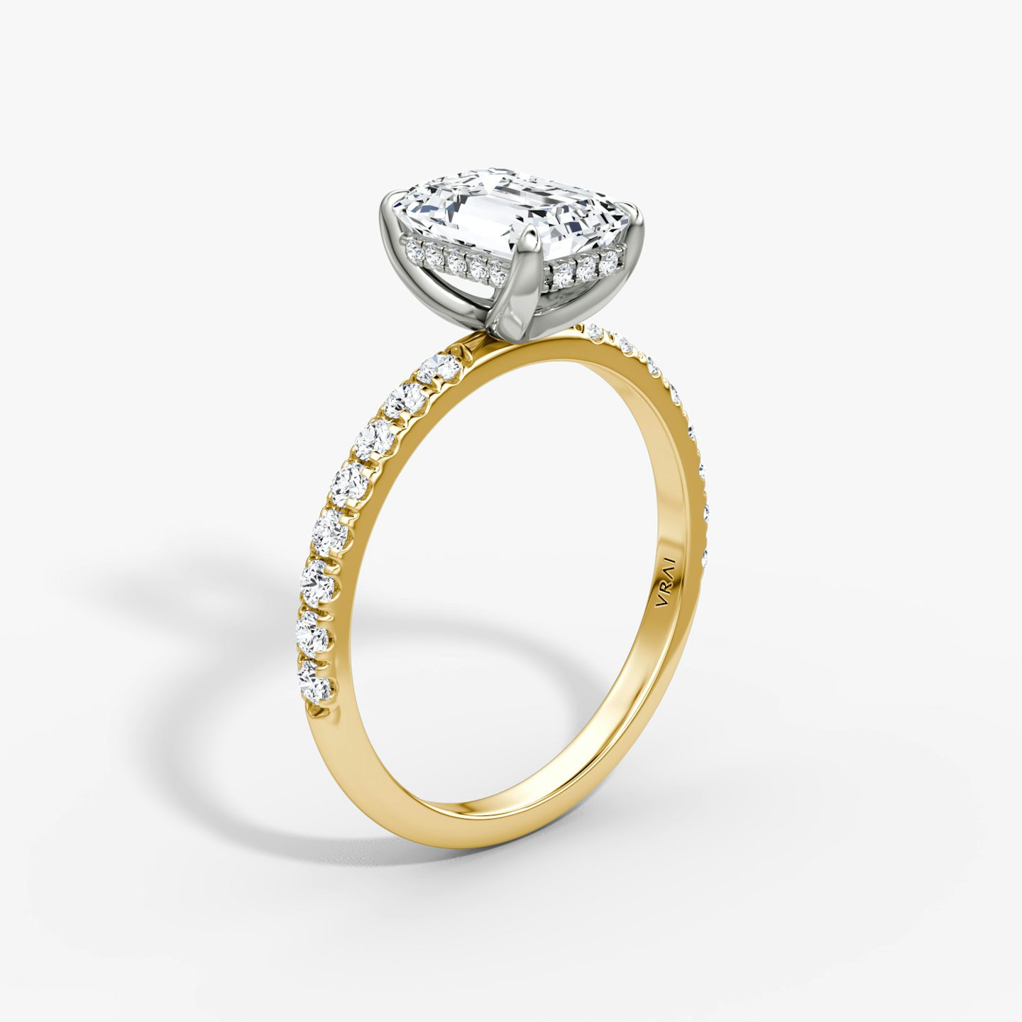 The Classic Hidden Halo | Emerald | 18k | Yellow Gold and Platinum | bandAccent: Pavé | bandWidth: large | prongStyle: Plain | diamondOrientation: vertical | caratWeight: other