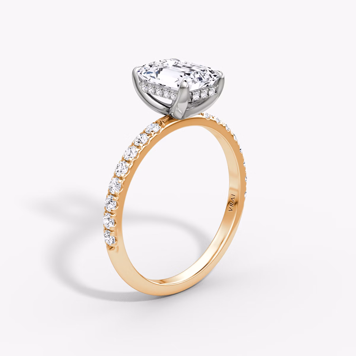 The Classic Hidden Halo | Emerald | 14k | Rose Gold and Platinum | bandAccent: Pavé | bandWidth: large | prongStyle: Plain | diamondOrientation: vertical | caratWeight: other