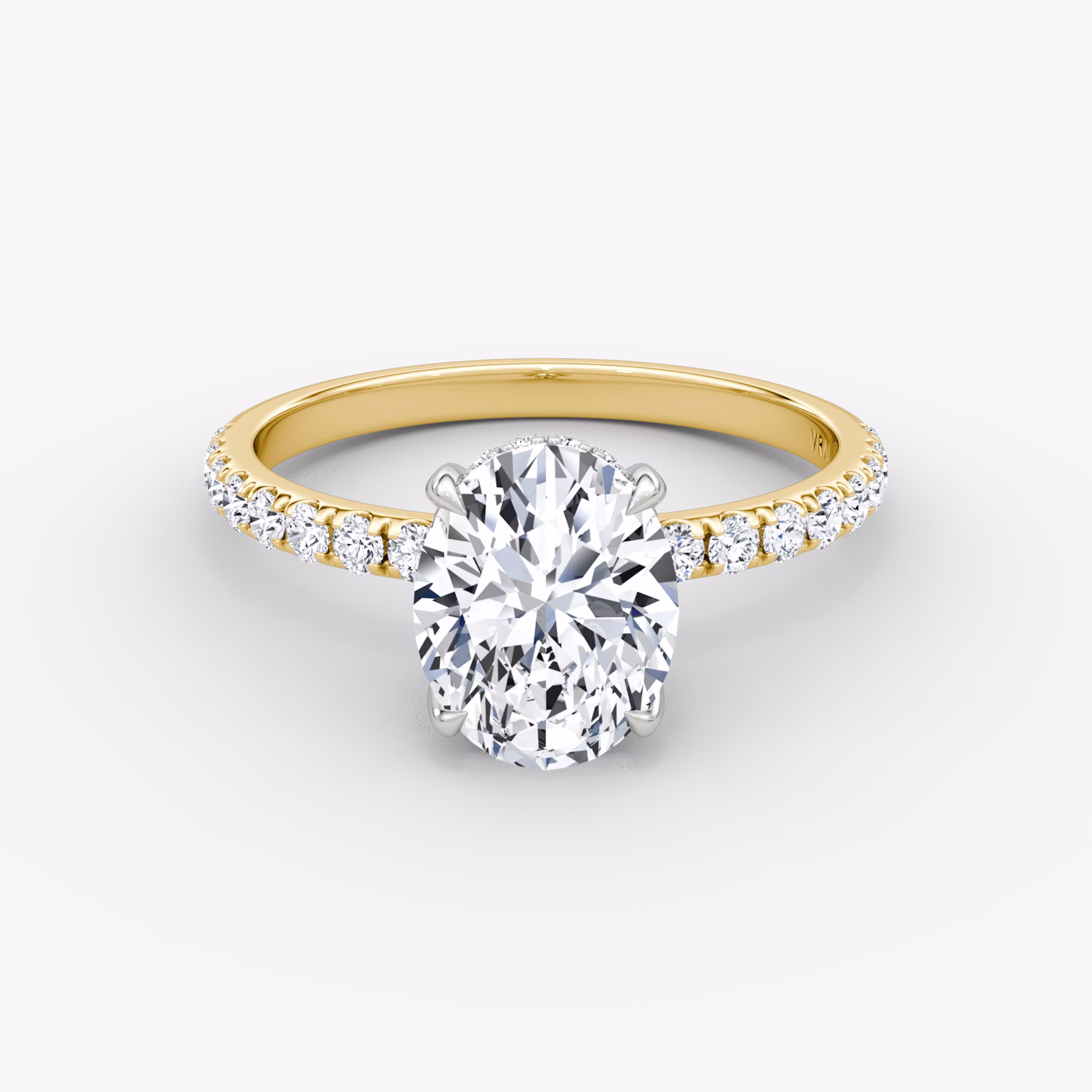 The Classic Hidden Halo | Oval | 18k | Yellow Gold and Platinum | bandAccent: Pavé | bandWidth: large | prongStyle: Plain | diamondOrientation: vertical | caratWeight: other