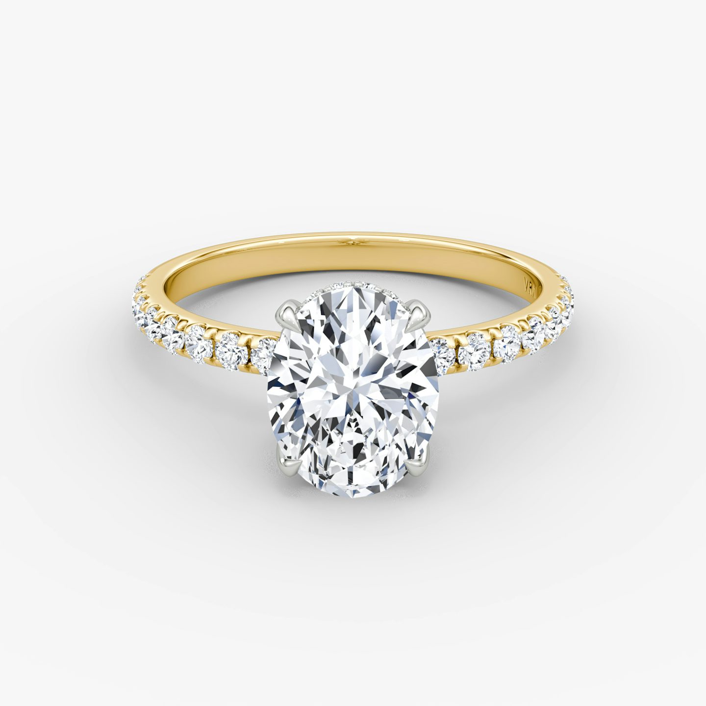 The Classic Hidden Halo | Oval | 18k | Yellow Gold and Platinum | bandAccent: Pavé | bandWidth: large | prongStyle: Plain | diamondOrientation: vertical | caratWeight: other