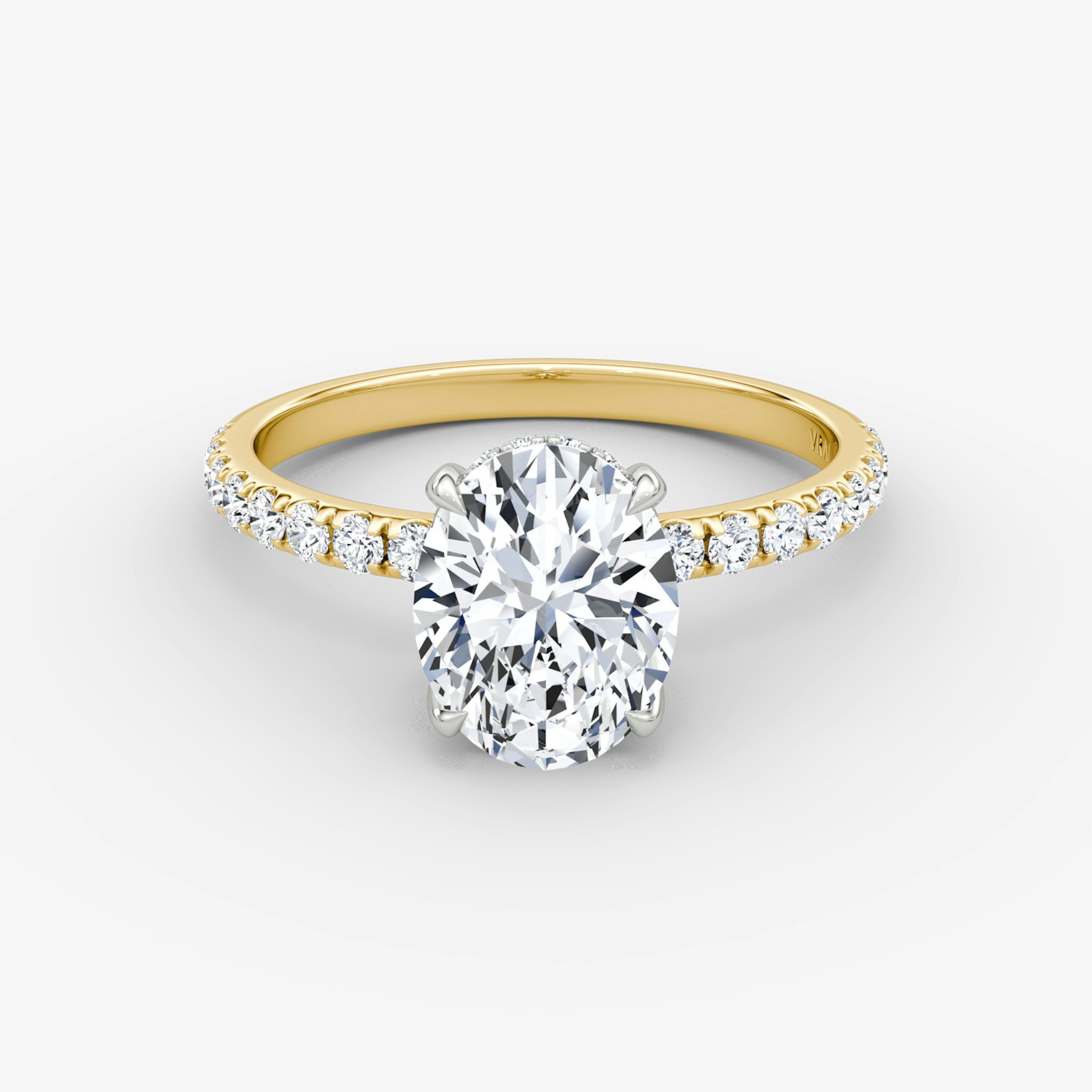 The Classic Hidden Halo | Oval | 18k | Yellow Gold and Platinum | bandAccent: Pavé | bandWidth: large | prongStyle: Plain | diamondOrientation: vertical | caratWeight: other