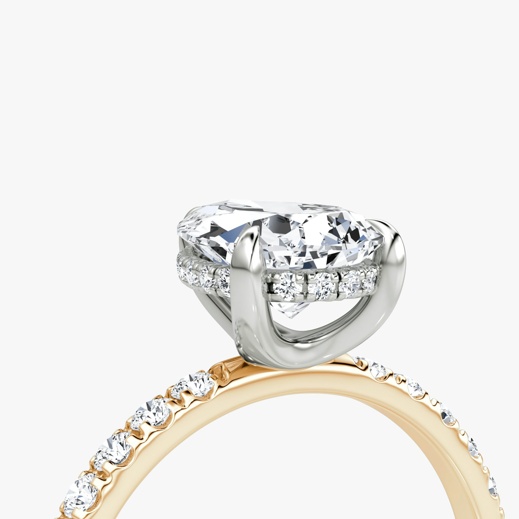 The Classic Hidden Halo | Pear | 14k | Rose Gold and Platinum | bandAccent: Pavé | bandWidth: large | prongStyle: Plain | diamondOrientation: vertical | caratWeight: other