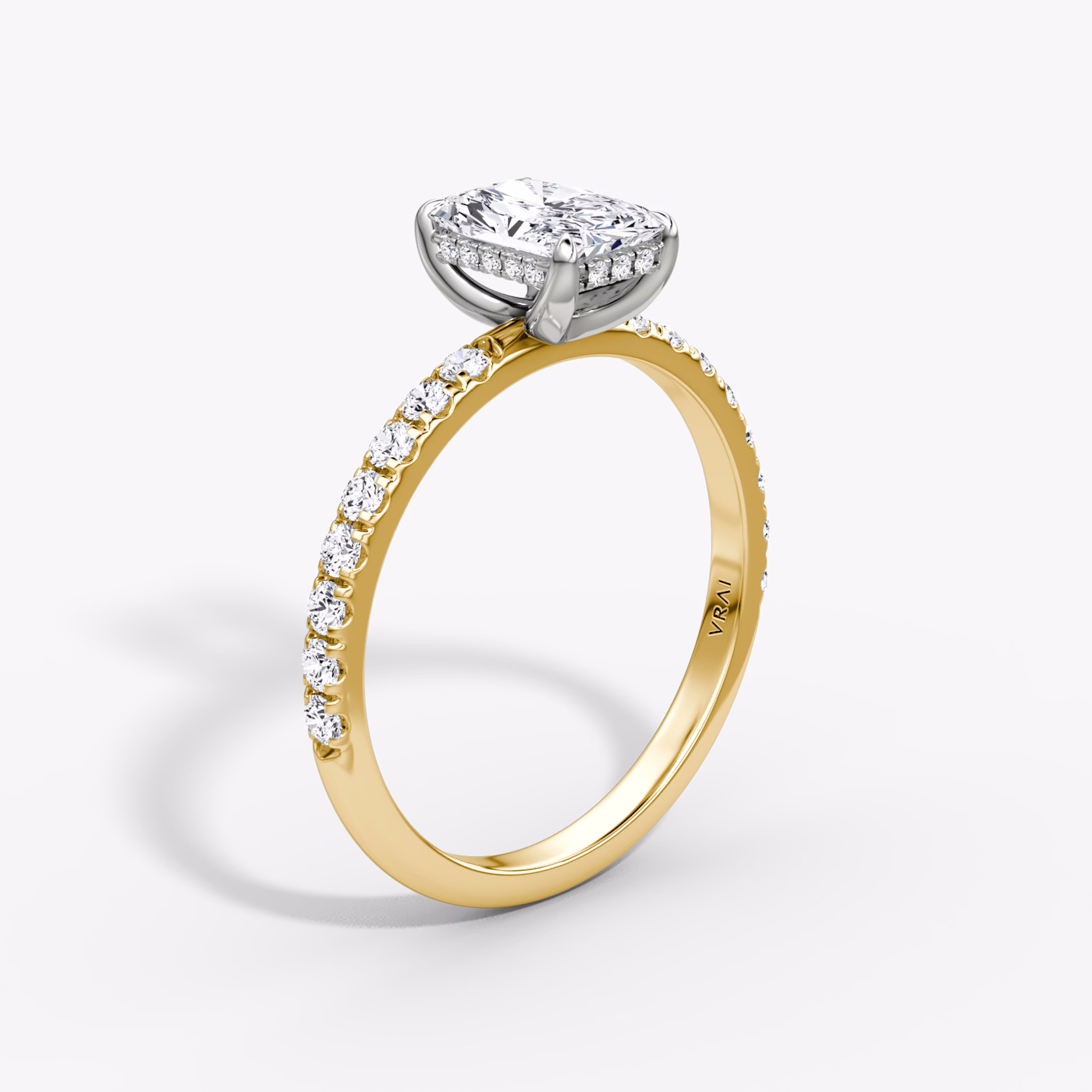 The Classic Hidden Halo | Radiant | 18k | Yellow Gold and Platinum | bandAccent: Pavé | bandWidth: large | prongStyle: Plain | diamondOrientation: vertical | caratWeight: other