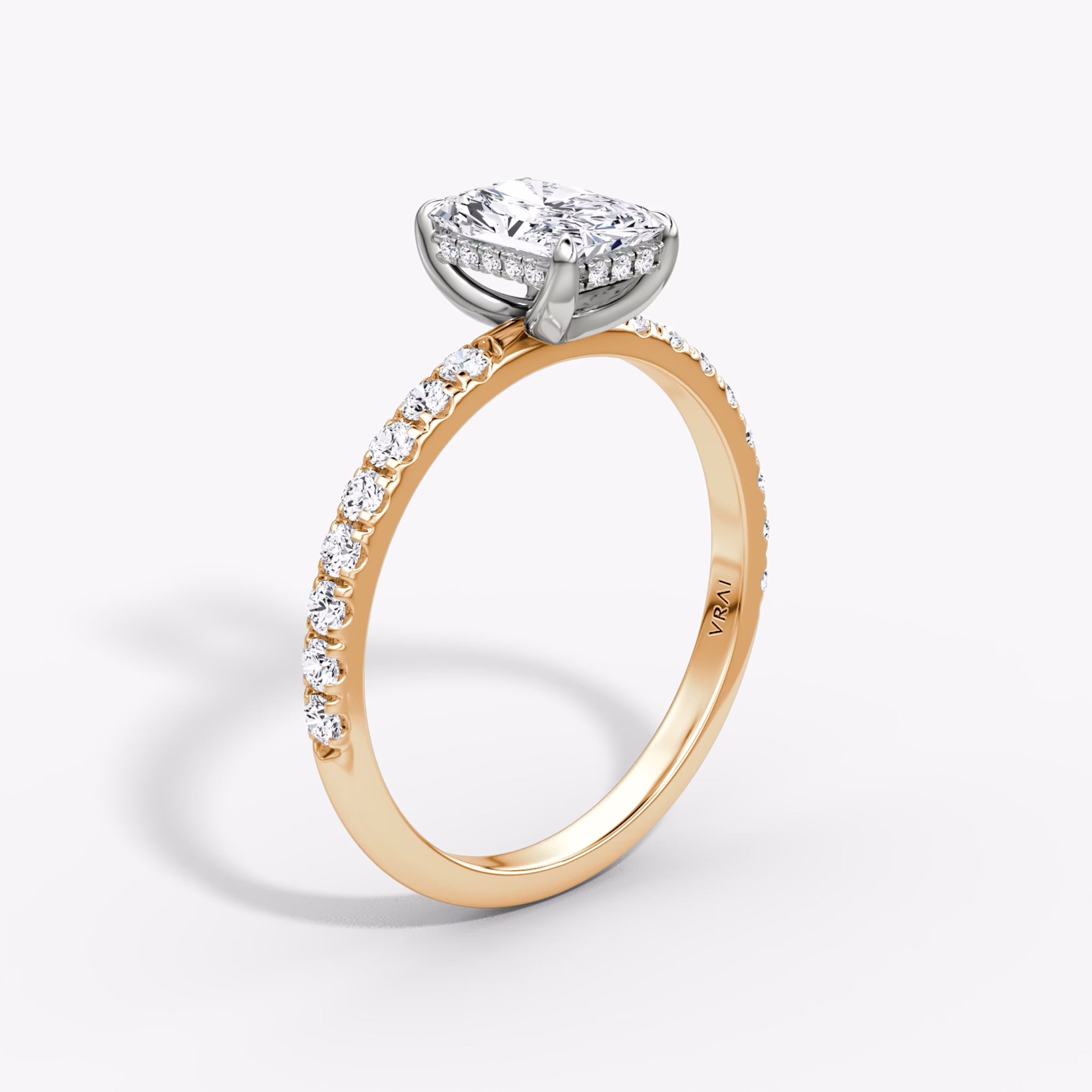 The Classic Hidden Halo | Radiant | 14k | Rose Gold and Platinum | bandAccent: Pavé | bandWidth: large | prongStyle: Plain | diamondOrientation: vertical | caratWeight: other