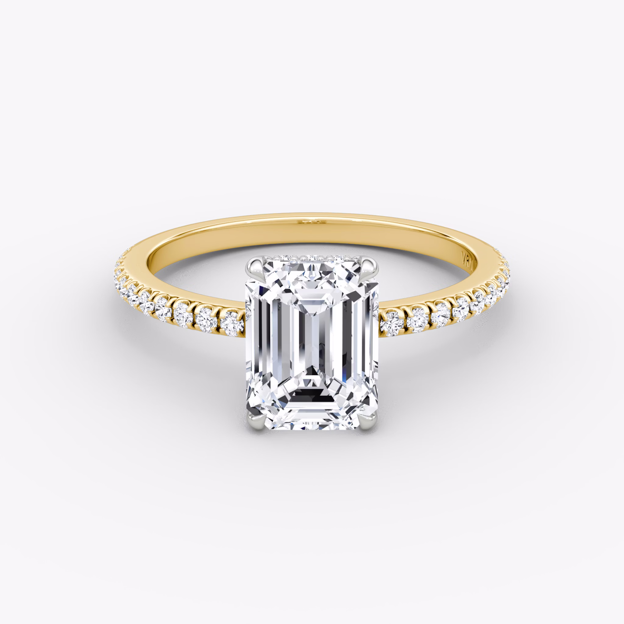 The Signature | Emerald | 18k | Yellow Gold and Platinum | bandAccent: Pavé | bandWidth: standard | hiddenHalo: yes | diamondOrientation: vertical | caratWeight: other