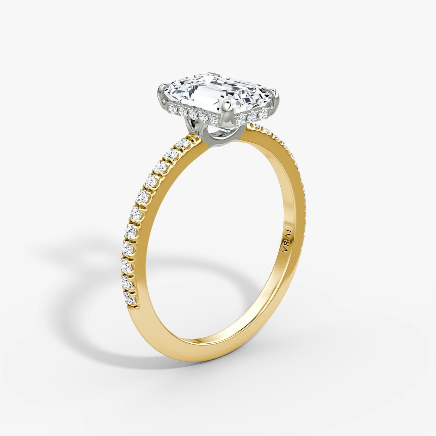 The Signature | Emerald | 18k | Yellow Gold and Platinum | bandAccent: Pavé | bandWidth: standard | hiddenHalo: yes | diamondOrientation: vertical | caratWeight: other