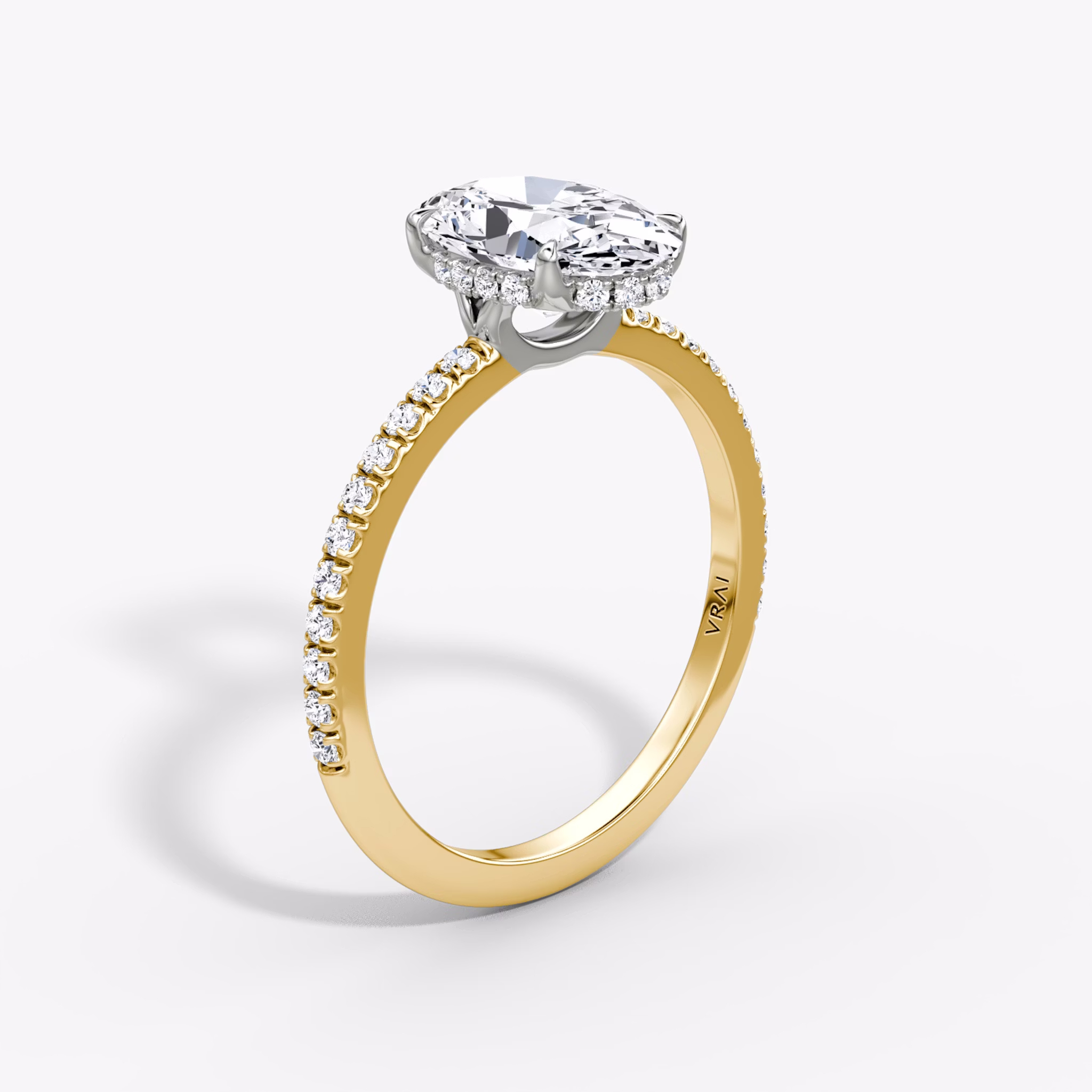 The Signature | Oval | 18k | Yellow Gold and Platinum | bandAccent: Pavé | bandWidth: standard | hiddenHalo: yes | diamondOrientation: vertical | caratWeight: other