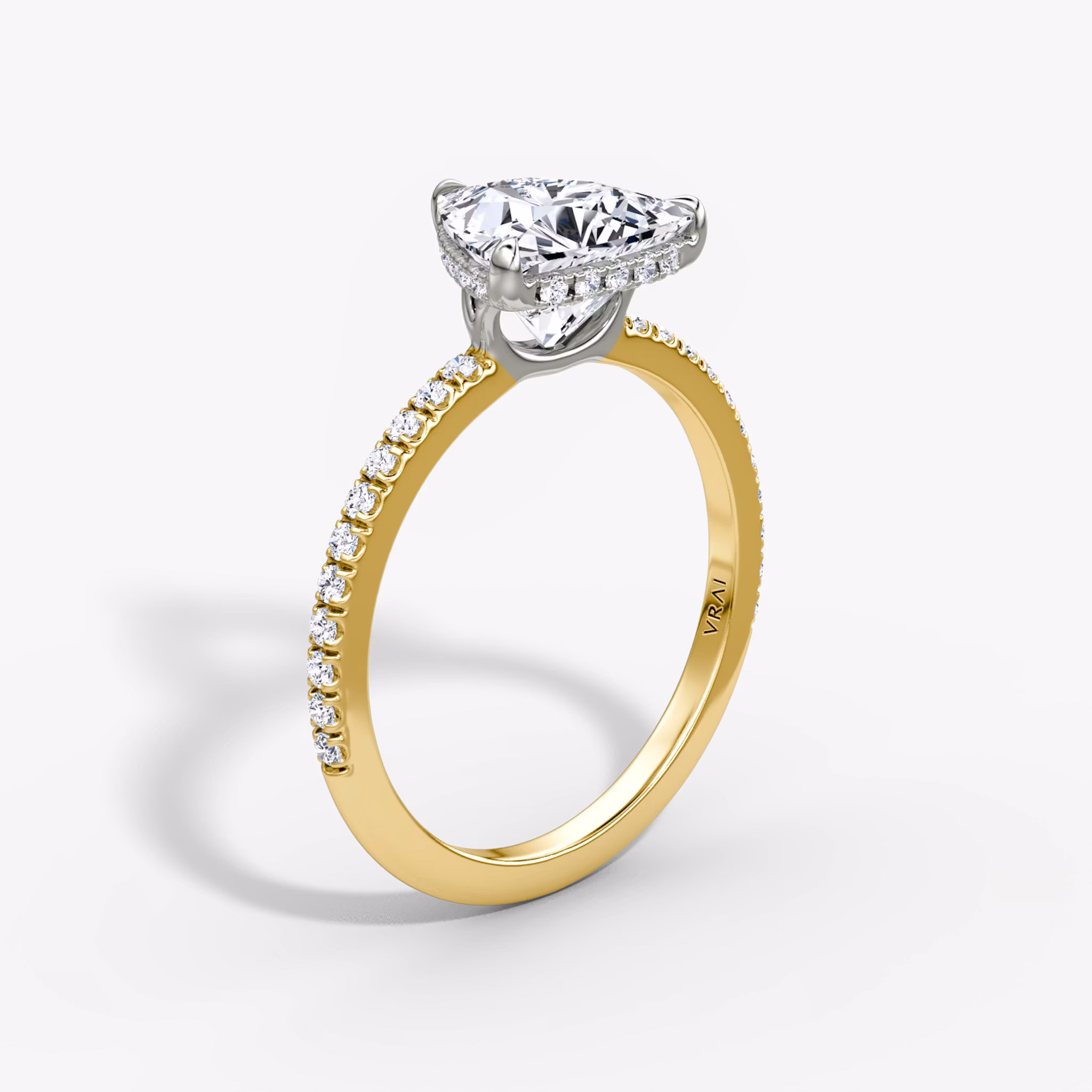 The Signature Trillion | 18K Yellow Gold and Platinum