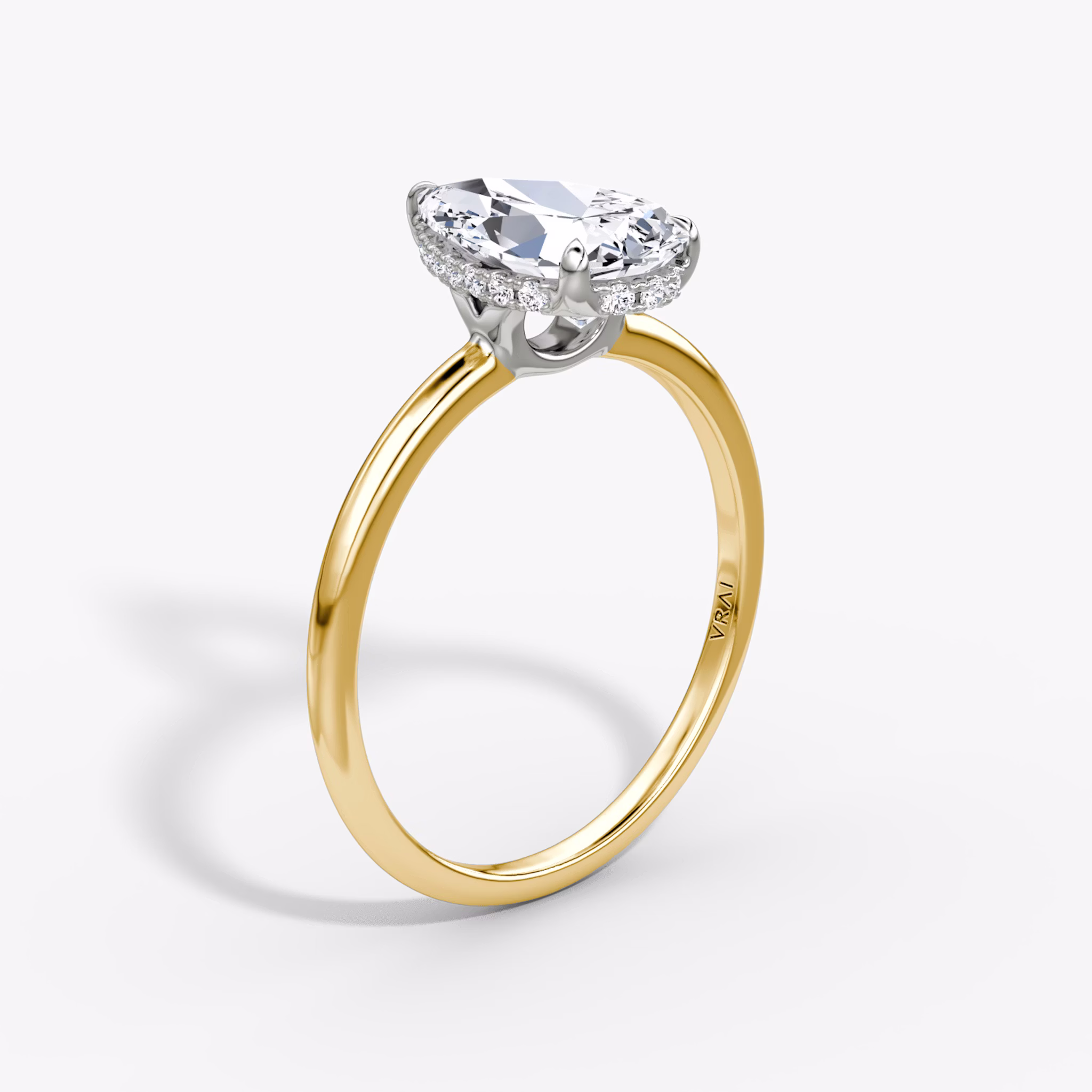 The Signature | Pear | 18k | Yellow Gold and Platinum | bandAccent: Plain | bandWidth: standard | hiddenHalo: yes | diamondOrientation: vertical | caratWeight: other