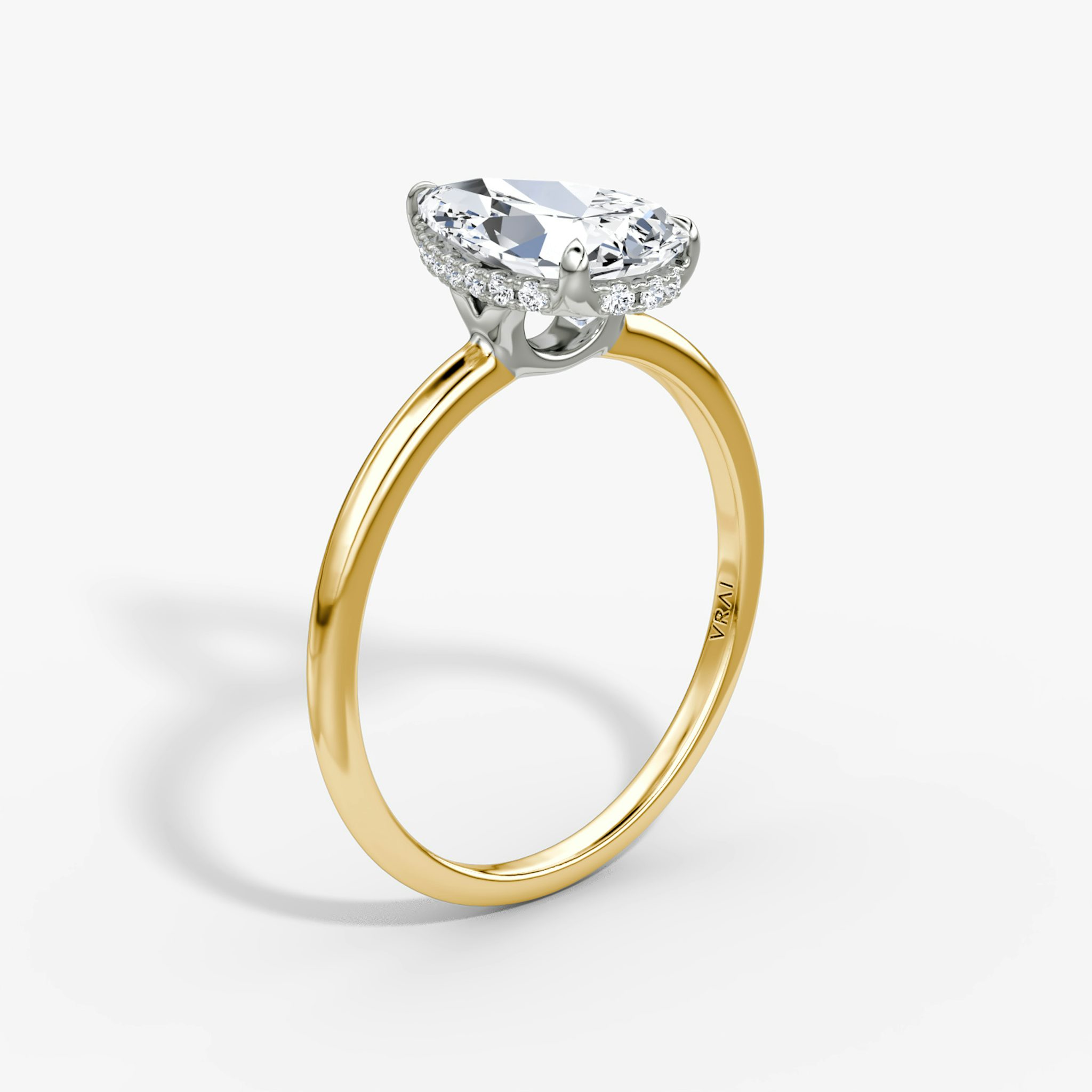 The Signature | Pear | 18k | Yellow Gold and Platinum | bandAccent: Plain | bandWidth: standard | hiddenHalo: yes | diamondOrientation: vertical | caratWeight: other