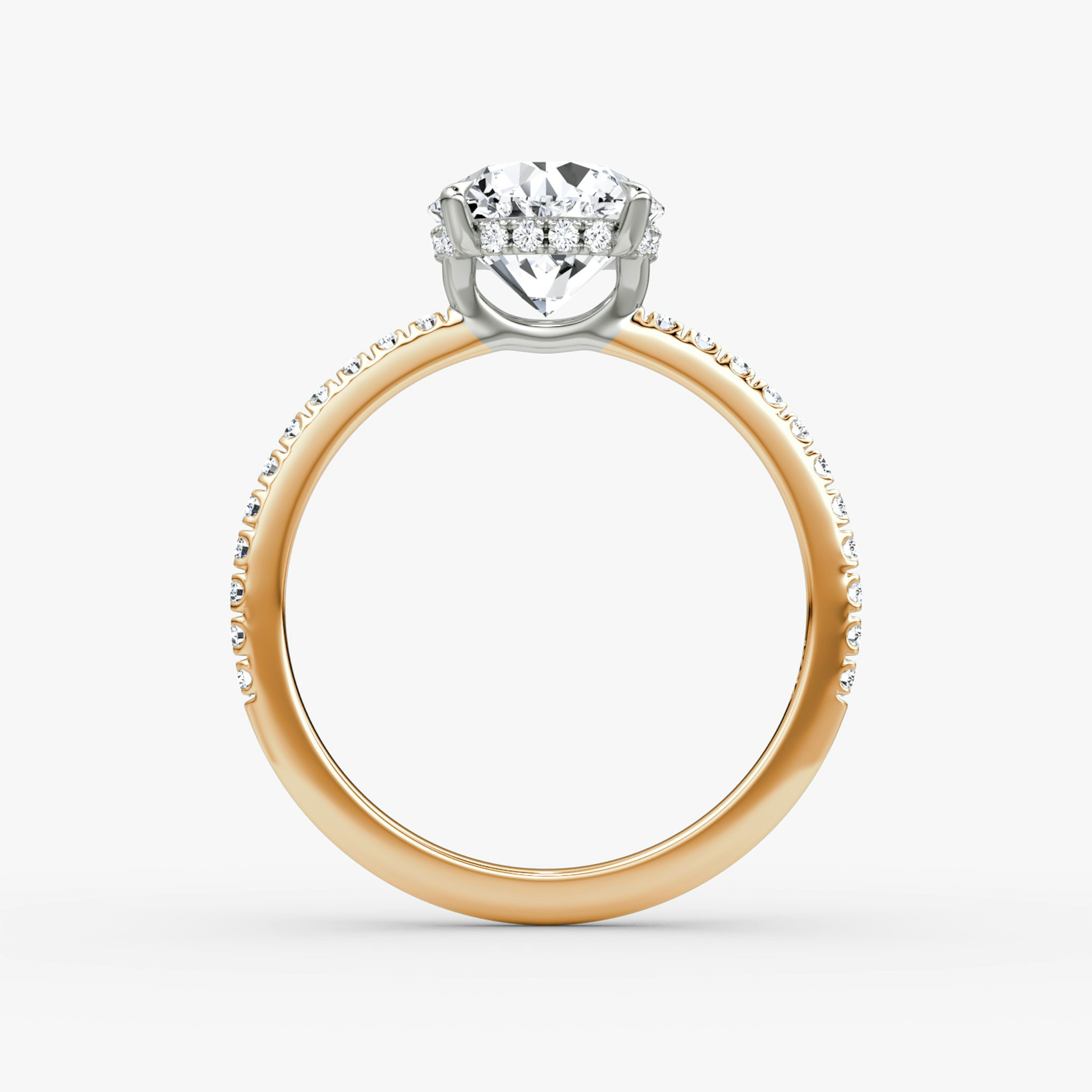 The Signature | Round Brilliant | 14k | Rose Gold and Platinum | bandAccent: Pavé | bandWidth: standard | caratWeight: 1.5ct | hiddenHalo: yes | diamondOrientation: vertical