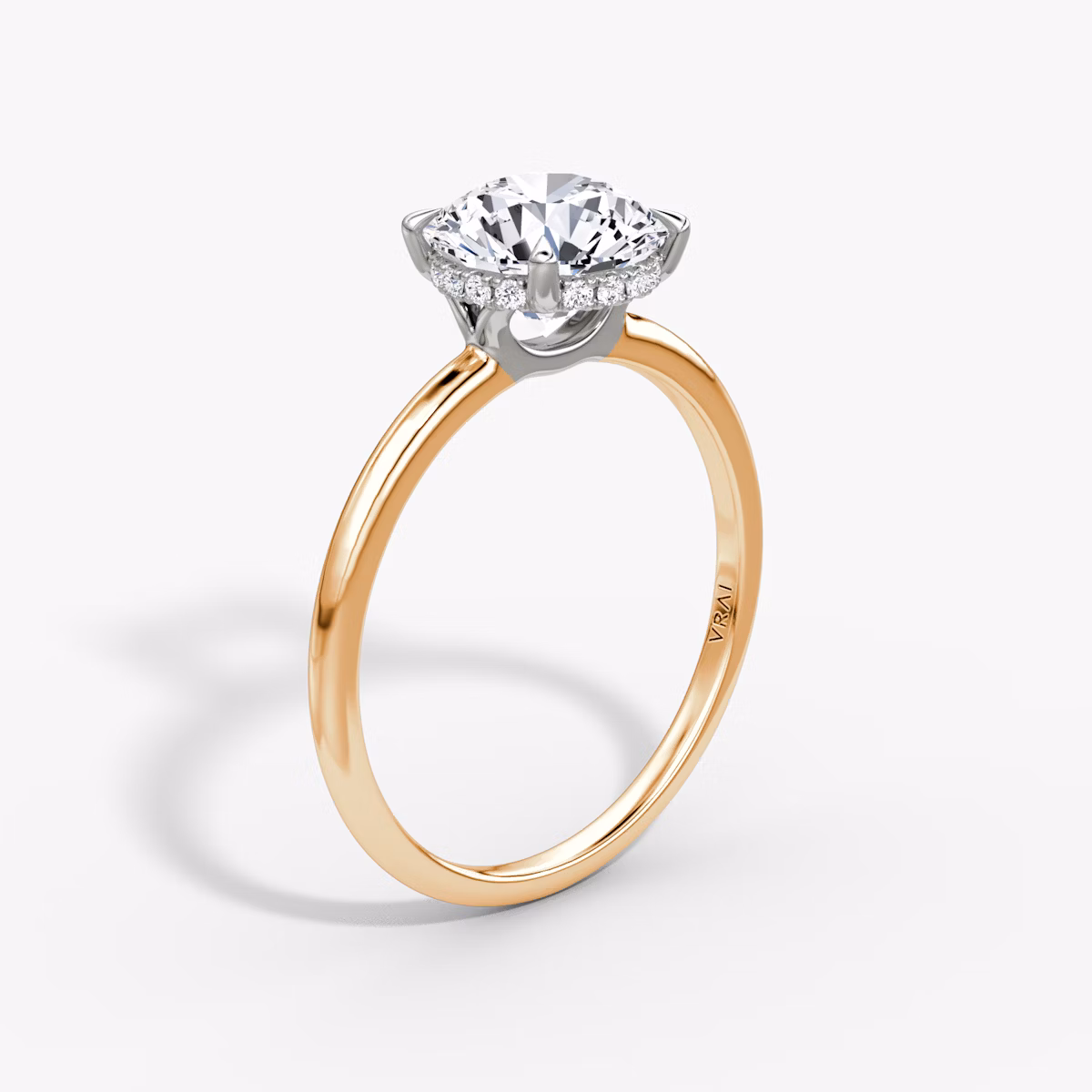 The Signature | Round Brilliant | 14k | Rose Gold and Platinum | bandAccent: Plain | bandWidth: standard | caratWeight: other | hiddenHalo: yes | diamondOrientation: vertical