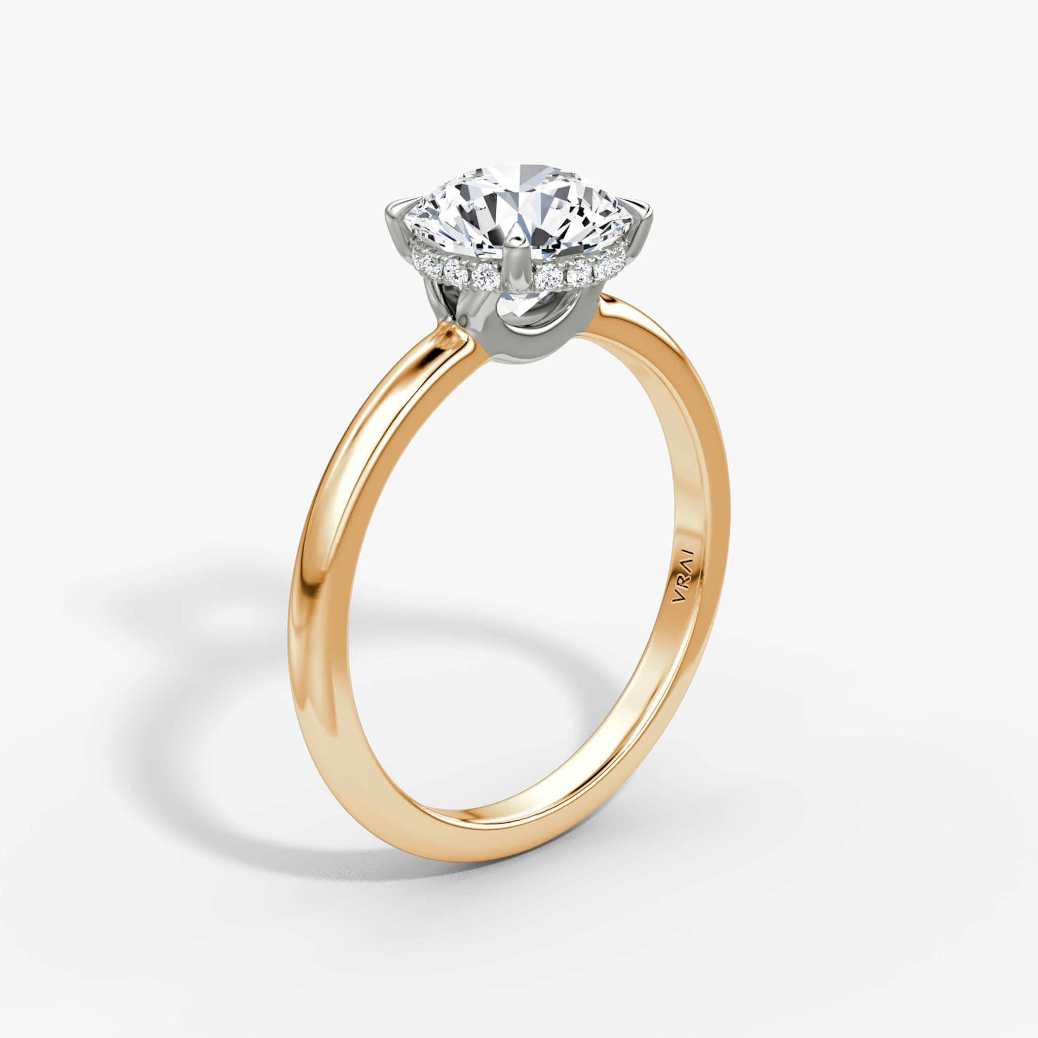 The Signature | Round Brilliant | 14k | Rose Gold and Platinum | bandAccent: Plain | bandWidth: large | caratWeight: 1.5ct | hiddenHalo: yes | diamondOrientation: vertical
