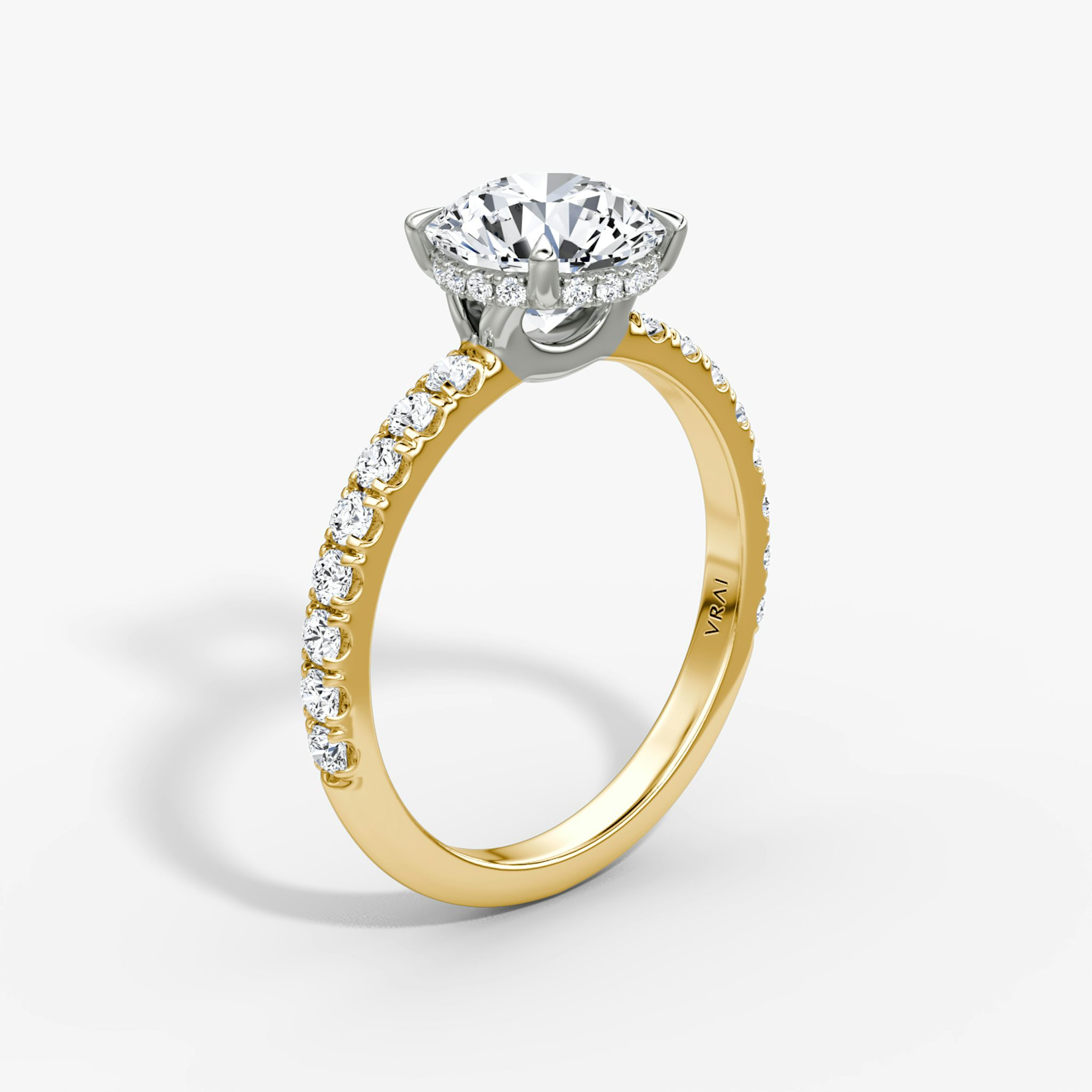 The Signature | Round Brilliant | 18k | Yellow Gold and Platinum | bandAccent: Pavé | bandWidth: large | caratWeight: 1.0ct | hiddenHalo: yes | diamondOrientation: vertical